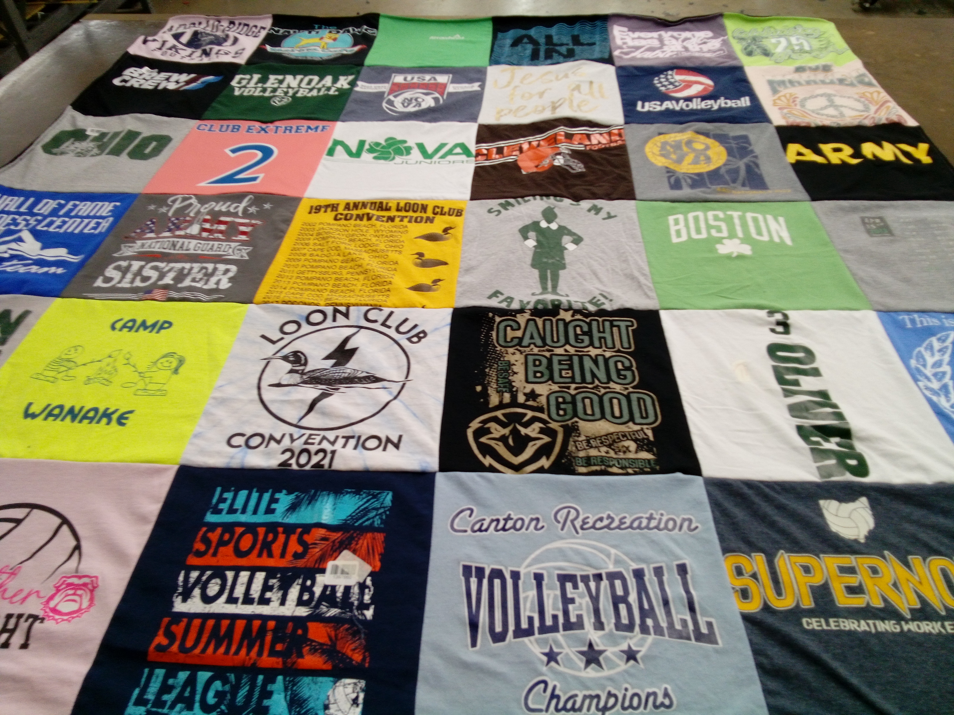 T-shirt quilt with volleyball, camping themes by Erin from OH