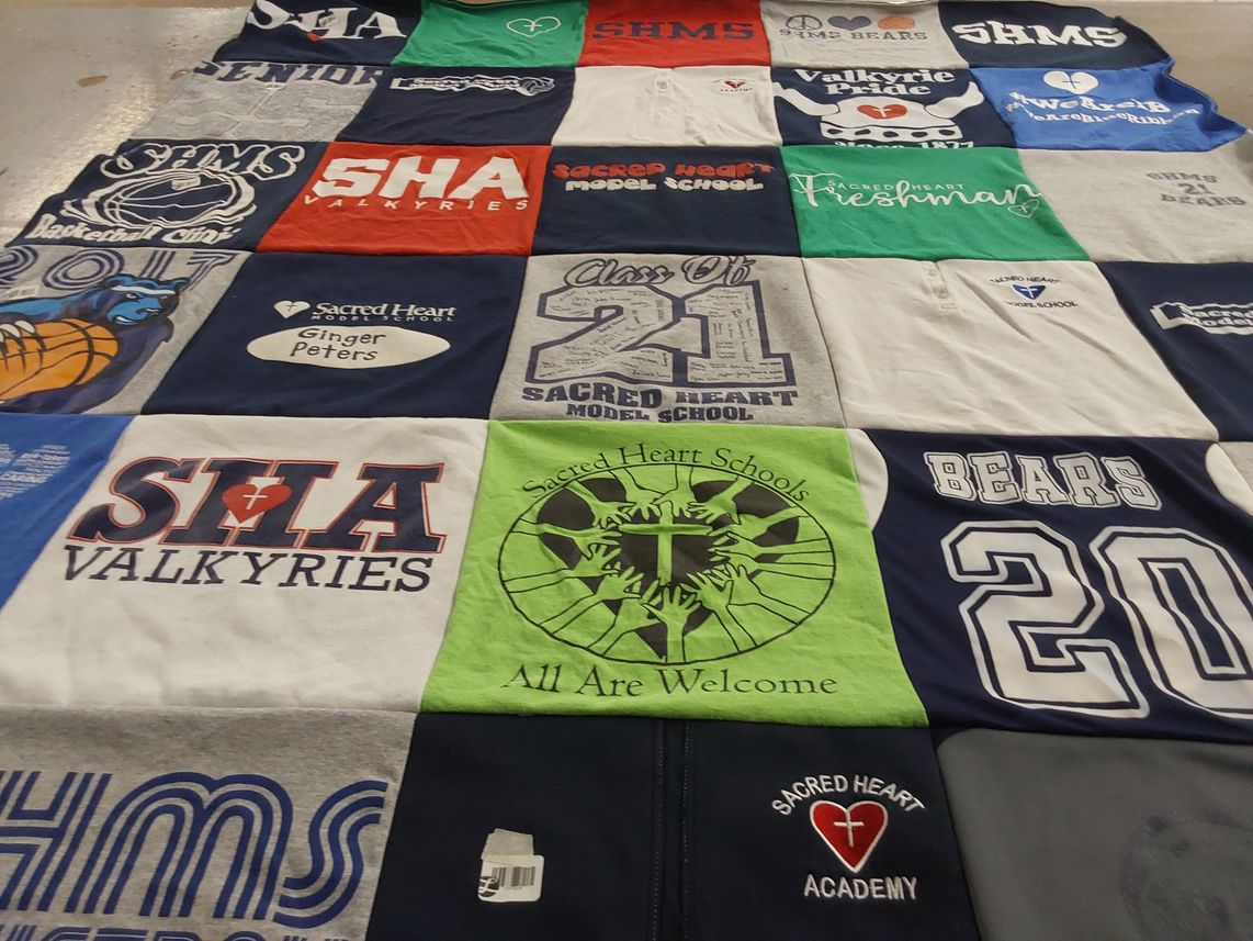 T-shirt quilt featuring sacred heart academy valkyries, sacred heart model school bears by Fran from KY