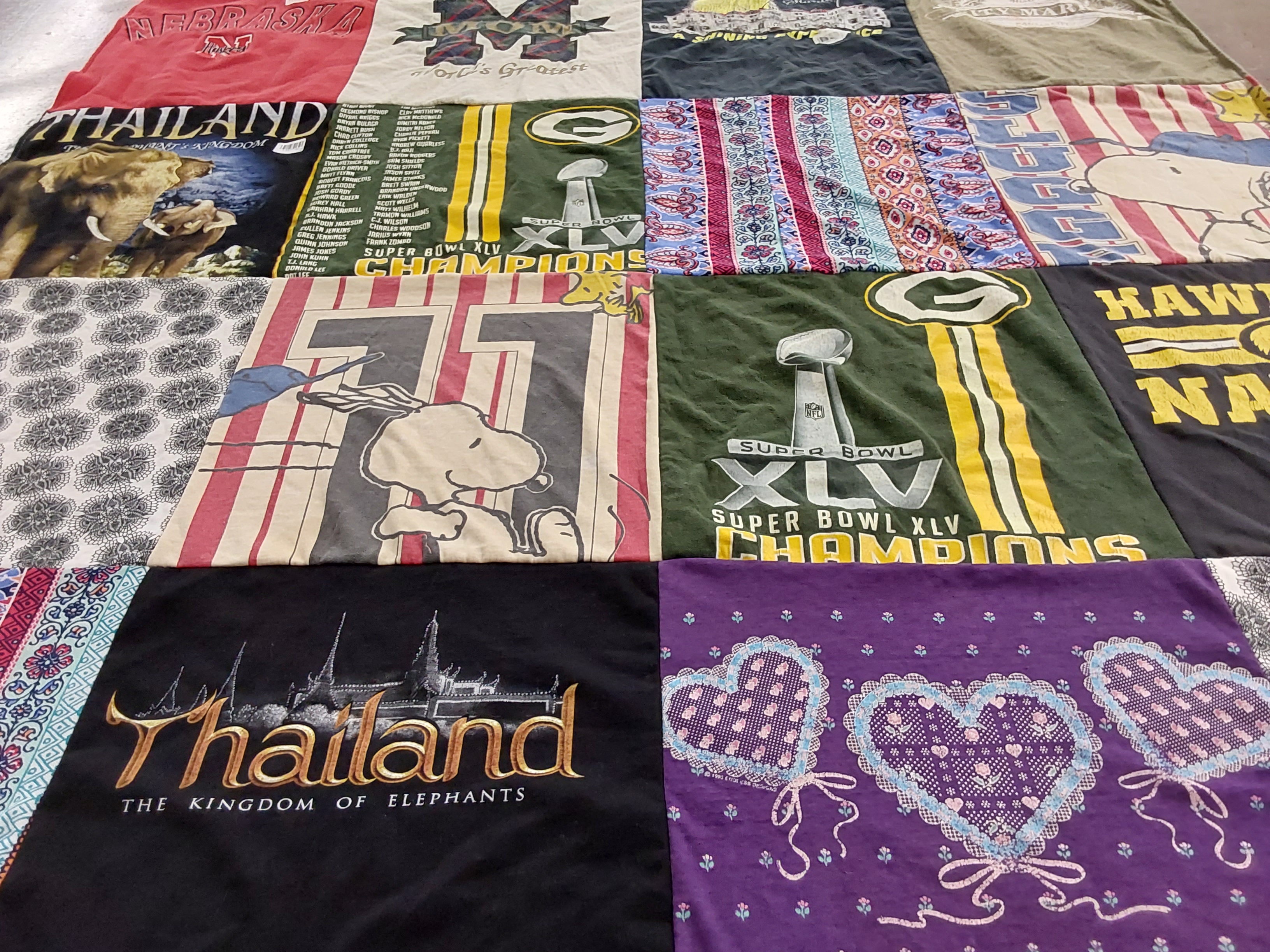T-shirt quilt with sports, travel themes by Ashley from MO