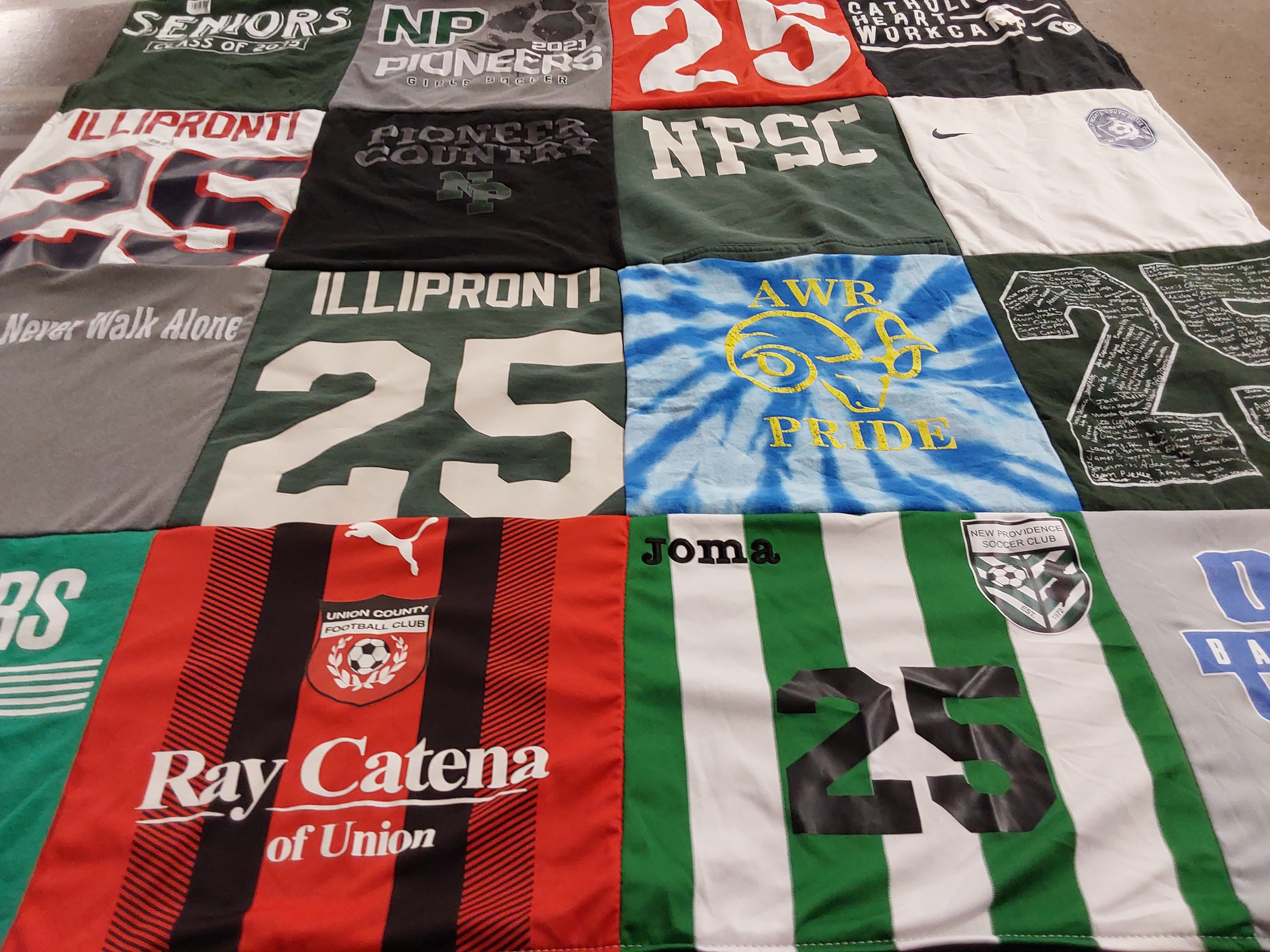 T-shirt quilt featuring new providence soccer club by Izabel from NJ
