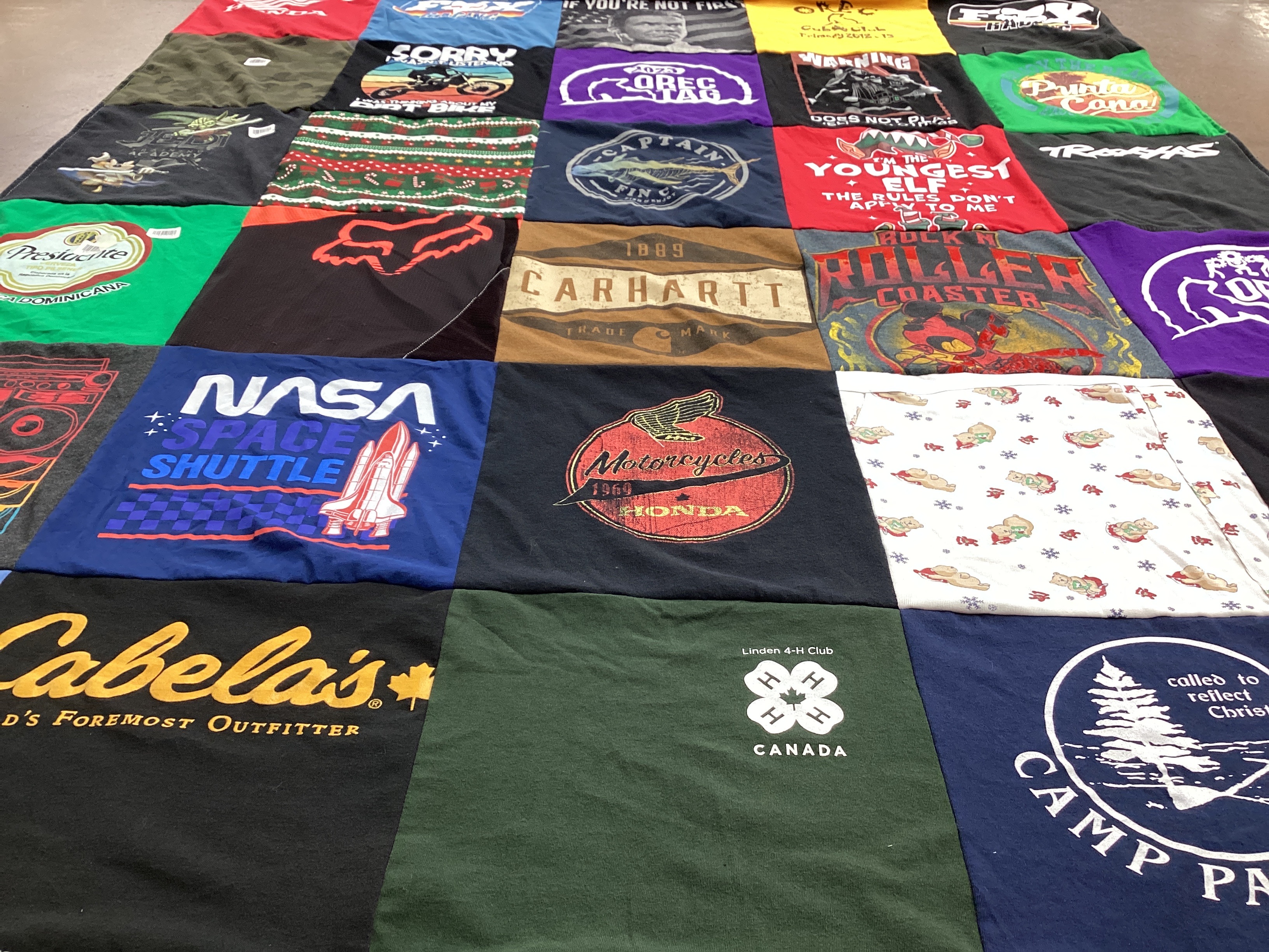 T-shirt quilt with space, outdoor activities themes by Andrea from NS