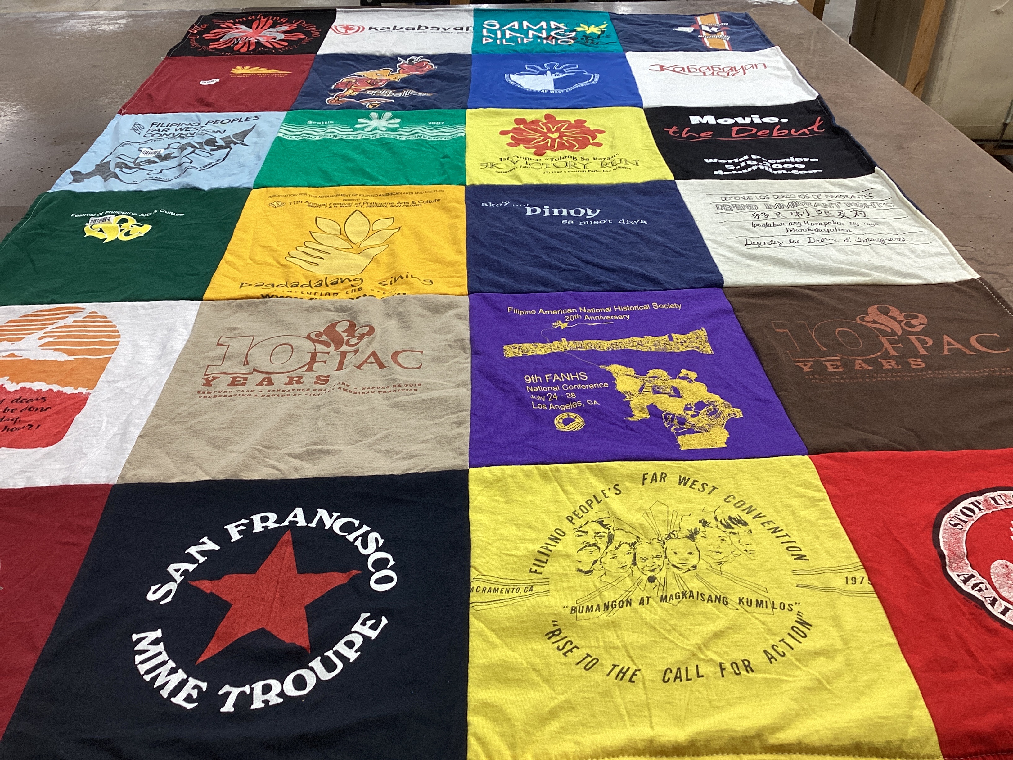 T-shirt quilt with filipino culture, performance arts themes by Florante from CA