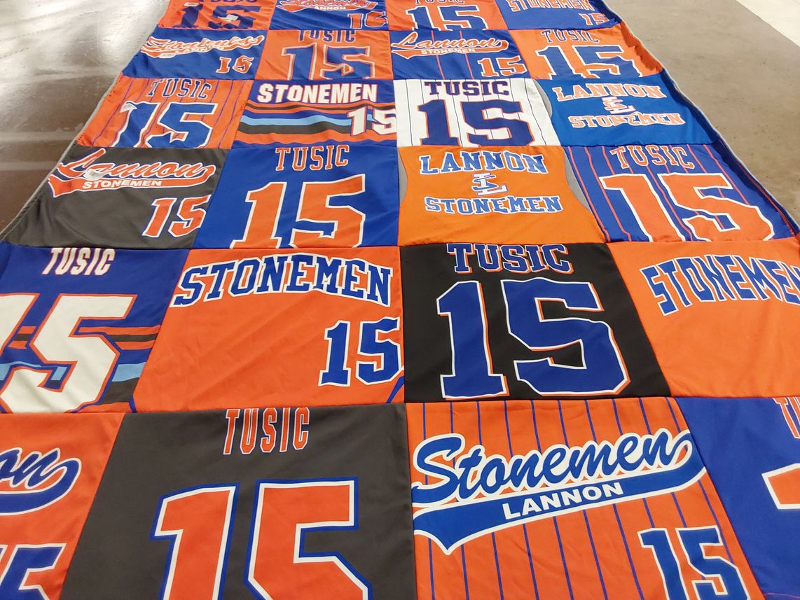 T-shirt quilt with sports, team activities themes by Tusic from WI