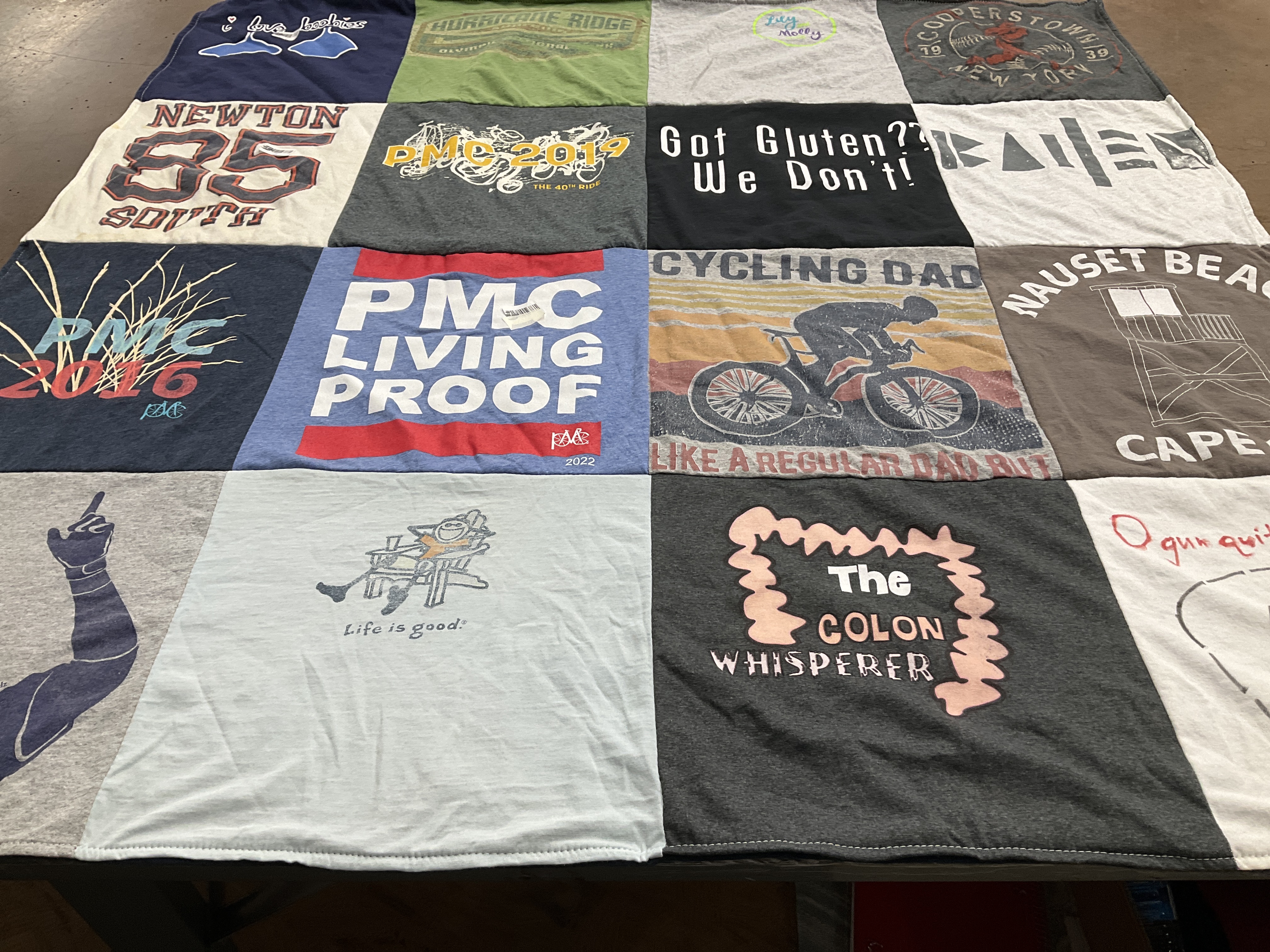 T-shirt quilt with cycling, gluten-free themes by Laurence from MA