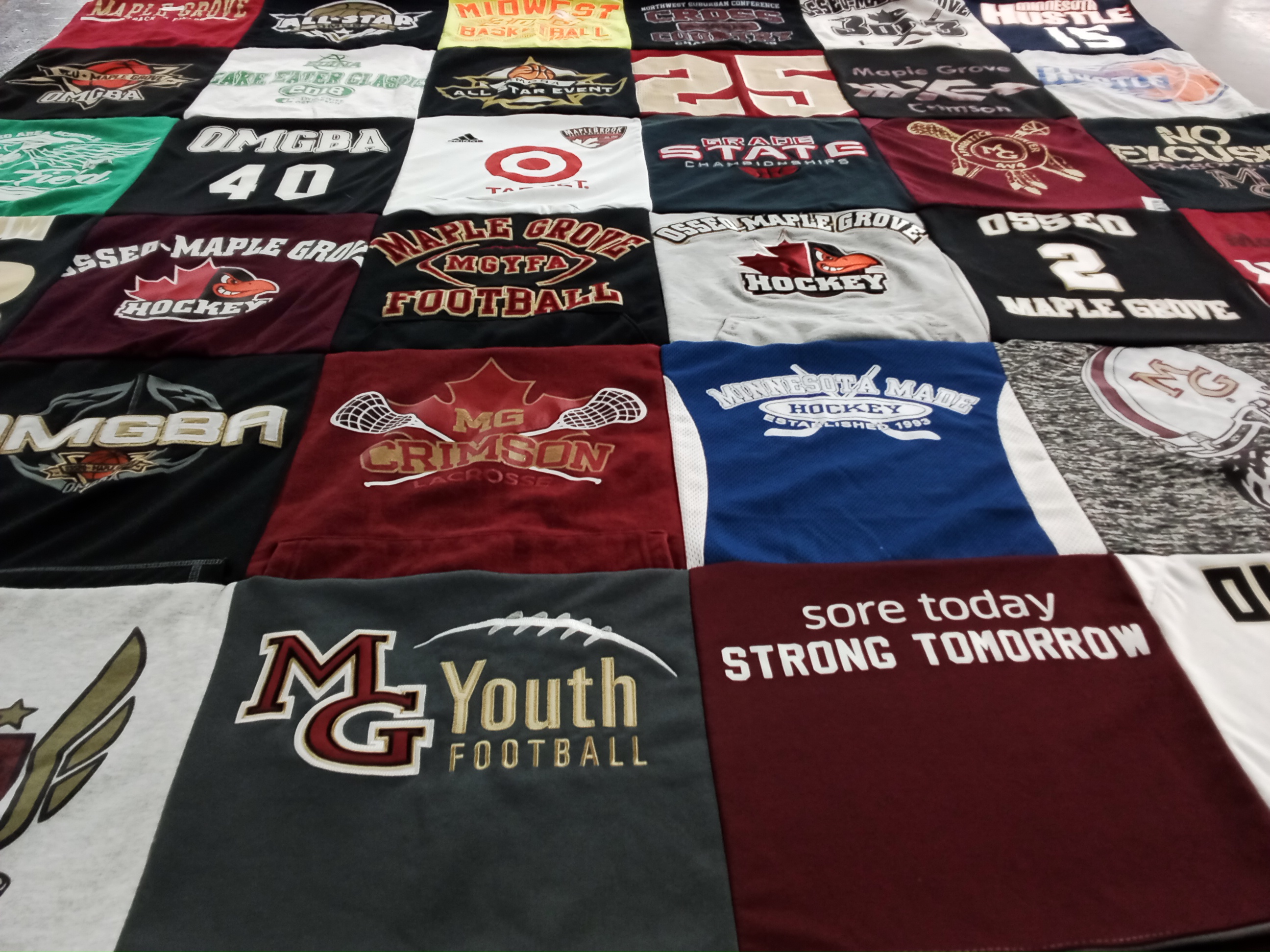 T-shirt quilt featuring osseomaplegrove hockey by Jill from MN