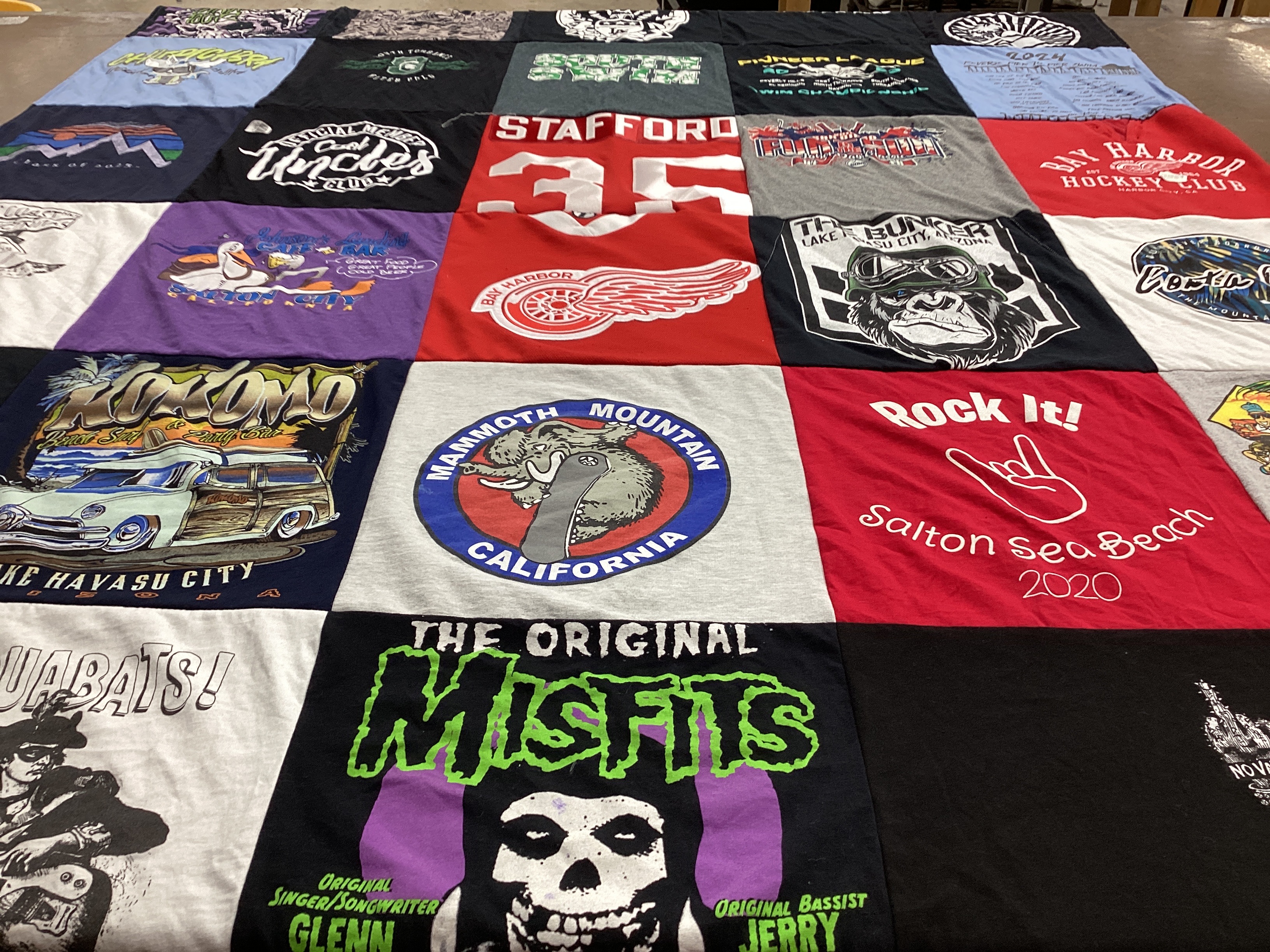T-shirt quilt with music, skiing themes by Wade from CA