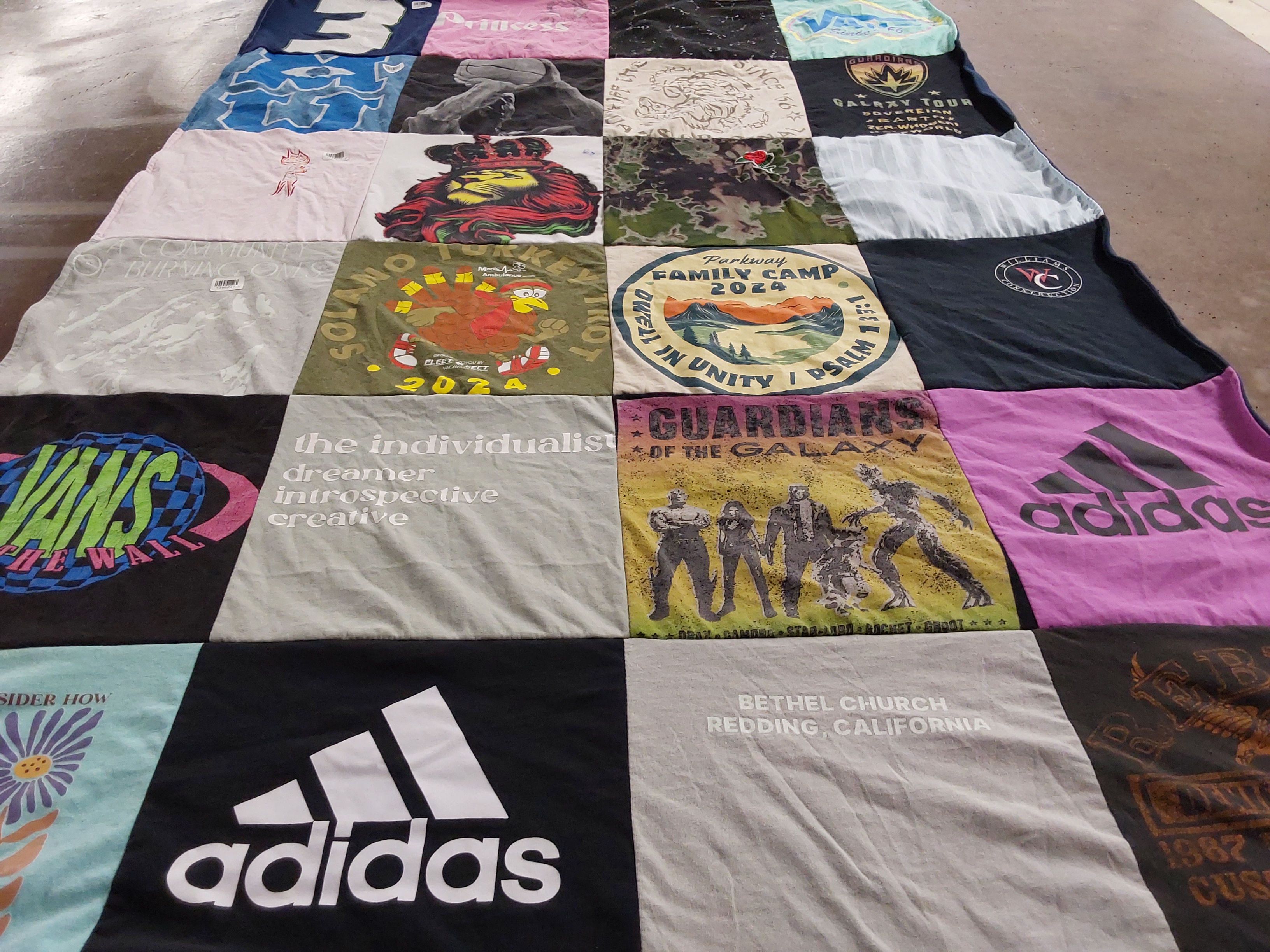 T-shirt quilt with music, art themes by Maddi from CA