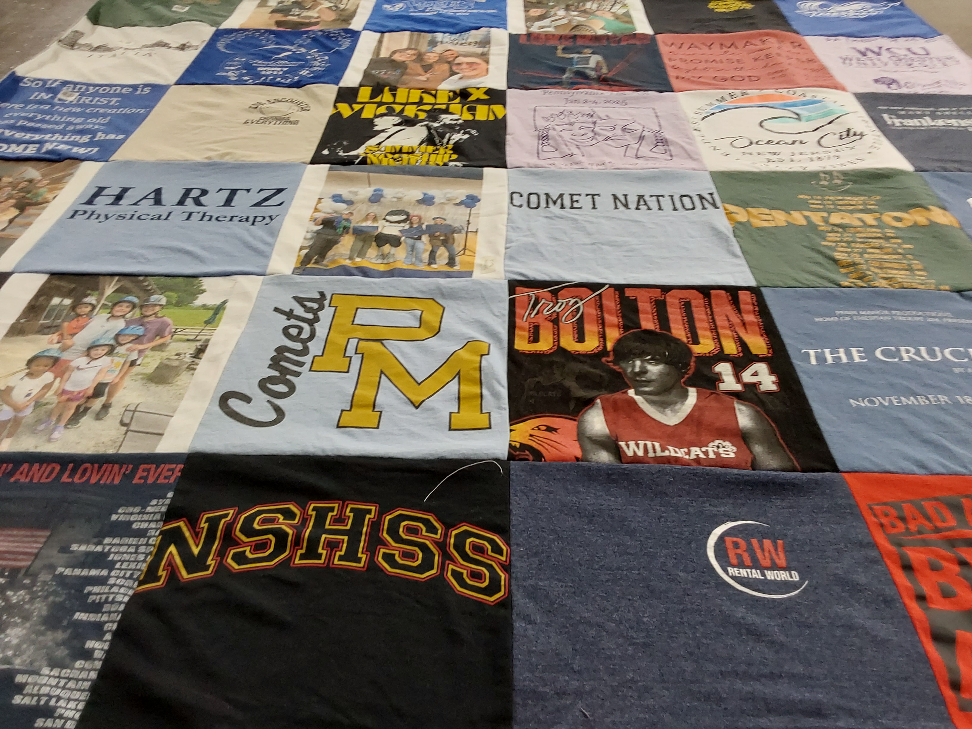 T-shirt quilt featuring wildcats, comets by Kim from PA