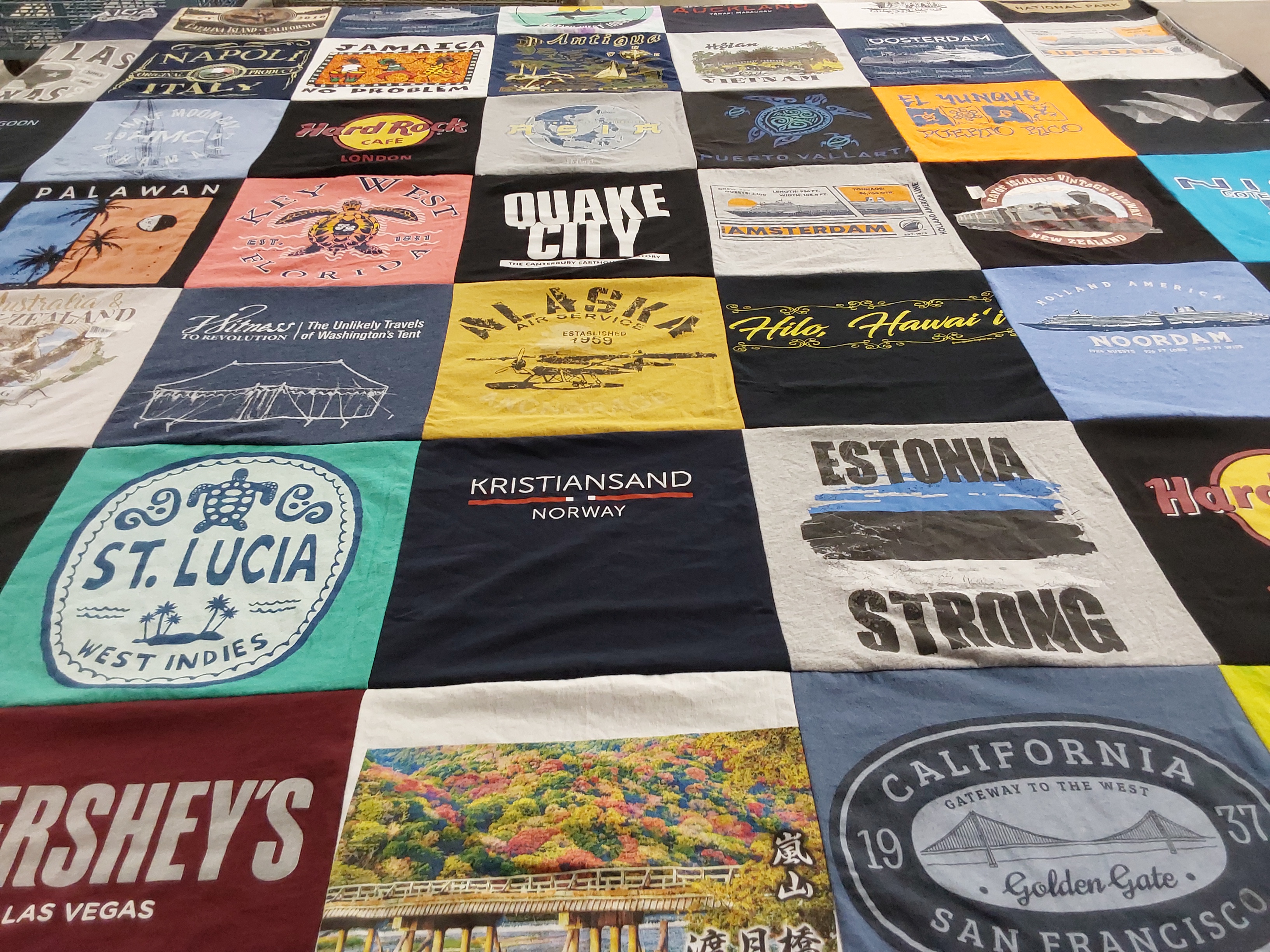T-shirt quilt with travel, beaches themes by Kenneth from WA