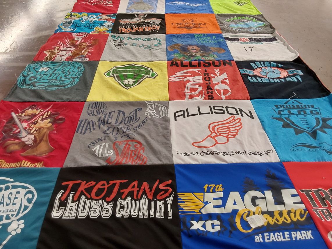 T-shirt quilt featuring rivers edge high school cross country team, trojans cross country team by Melissa from IN