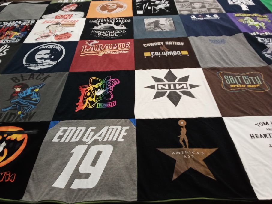 T-shirt quilt with music, movies themes by Christie from CO