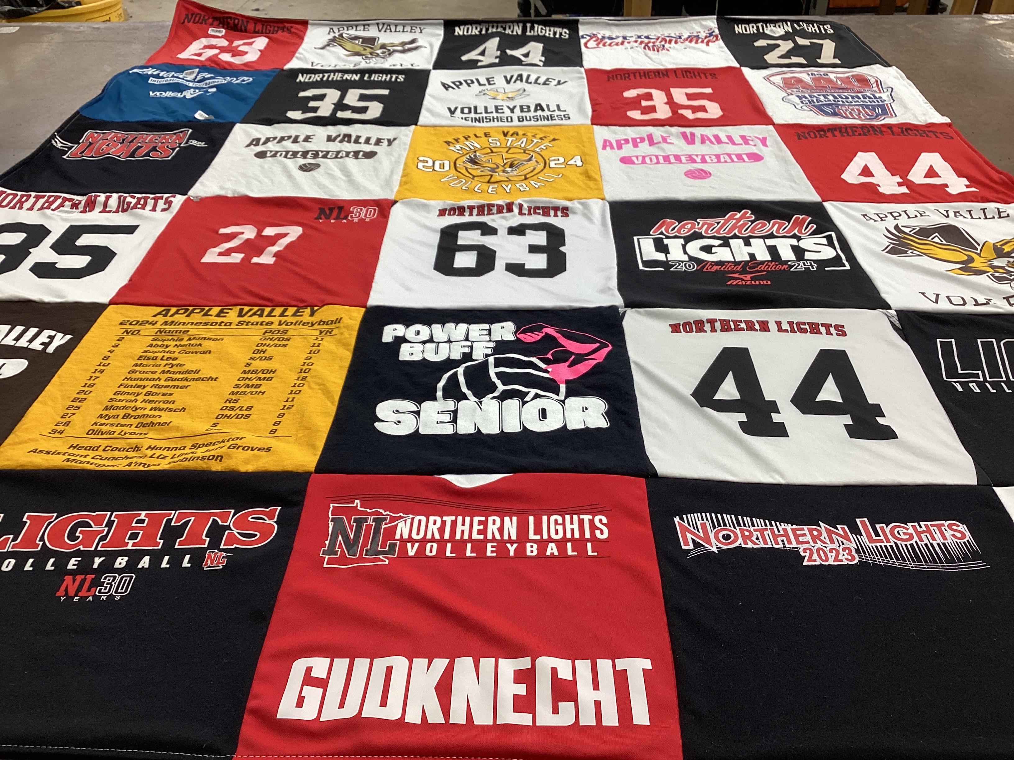 T-shirt quilt featuring northern lights volleyball by Erin from MN