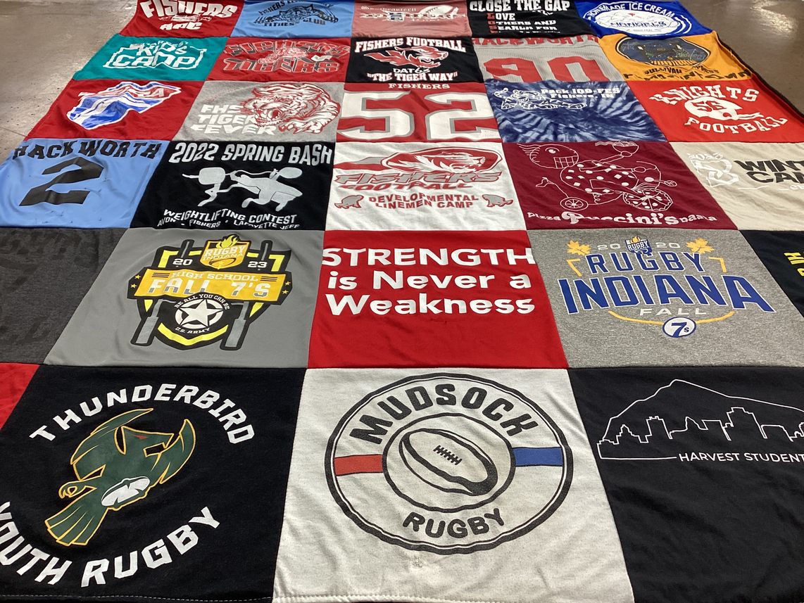 T-shirt quilt with rugby, fitness themes by Jodi from IN
