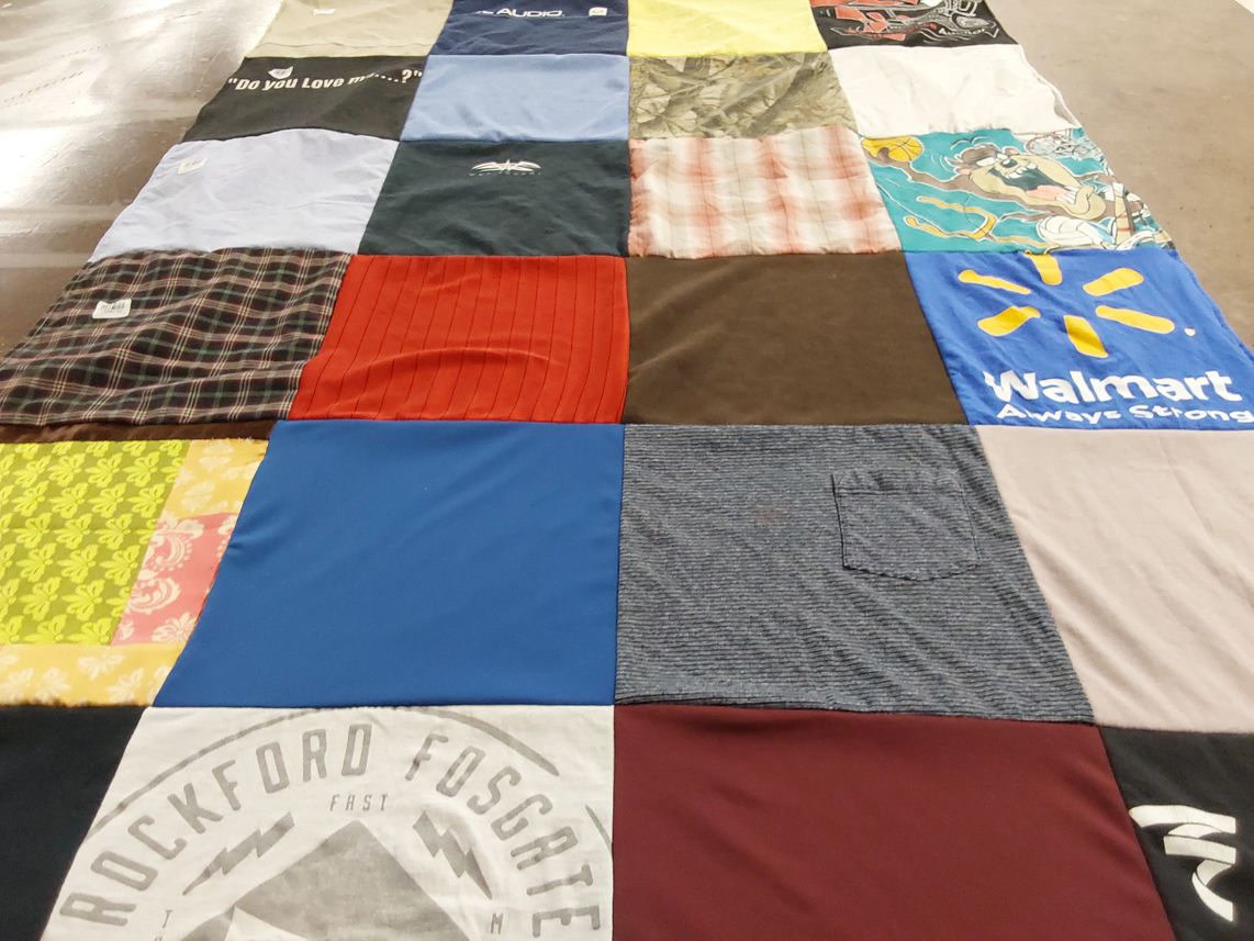 T-shirt quilt with music, shopping themes by Rachel from TX
