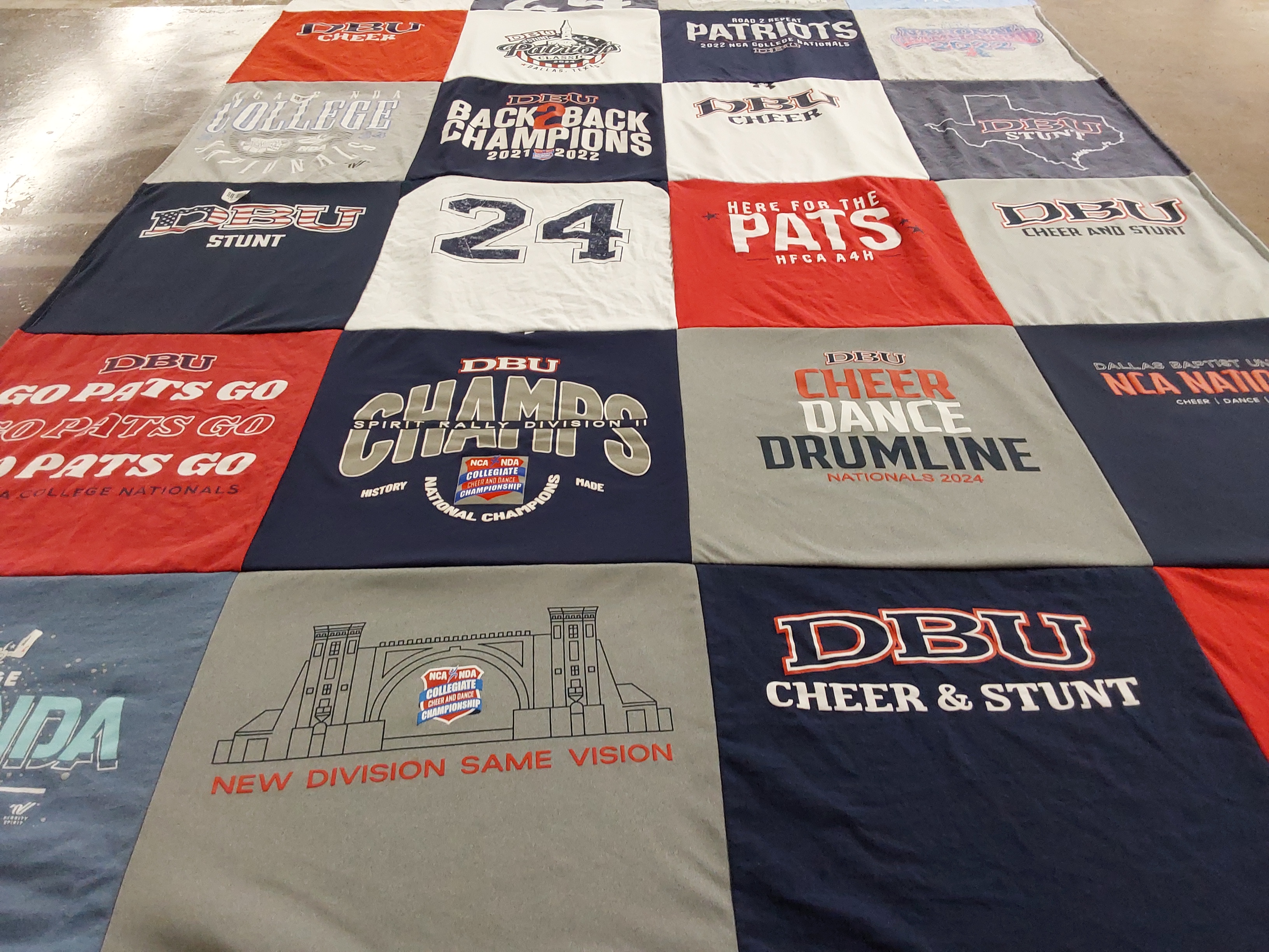 T-shirt quilt featuring dallas baptist university cheer and stunt team by Bridget from TX