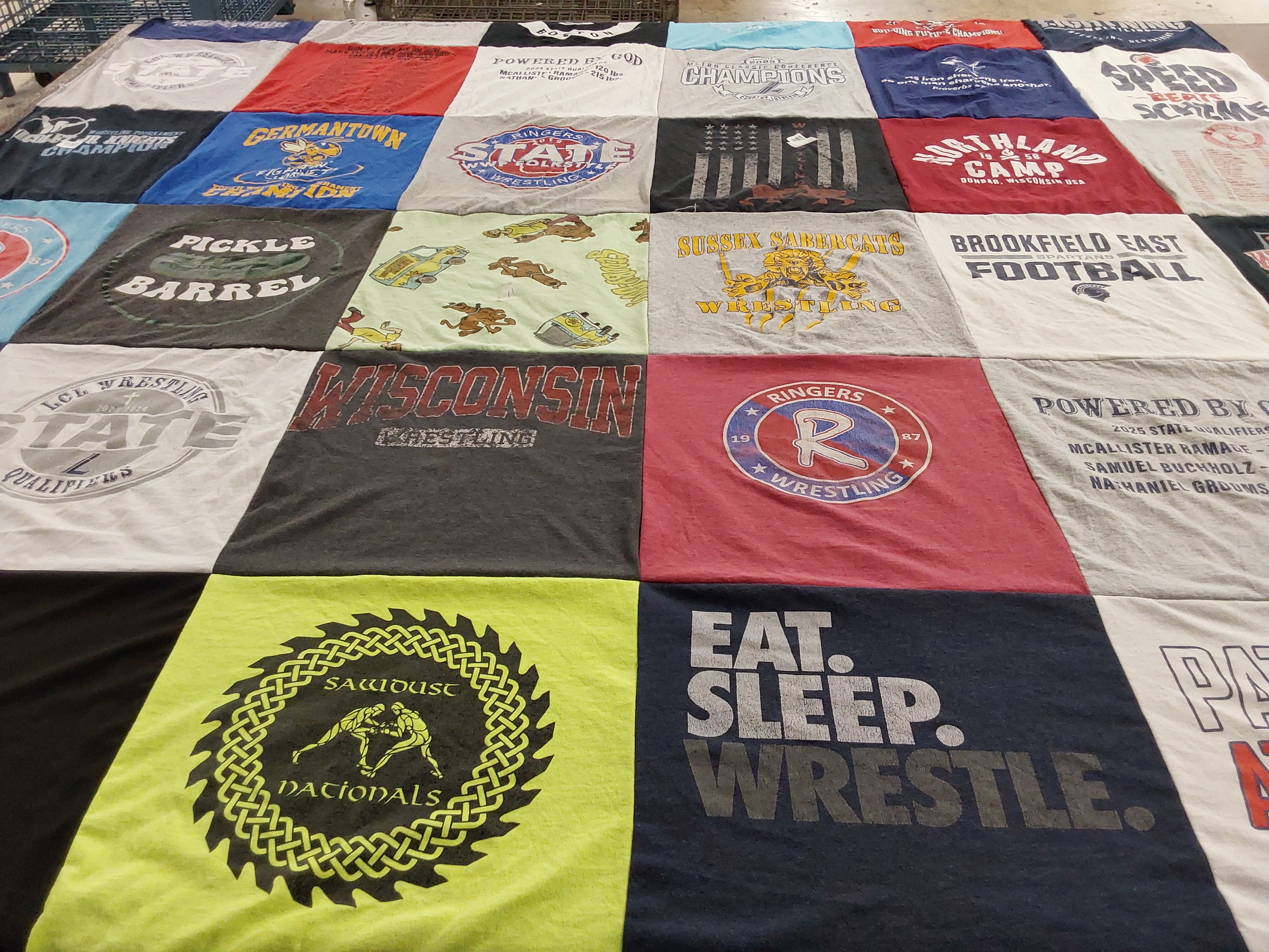T-shirt quilt featuring ringers wrestling, sussex sarecats wrestling by Laurie from WI