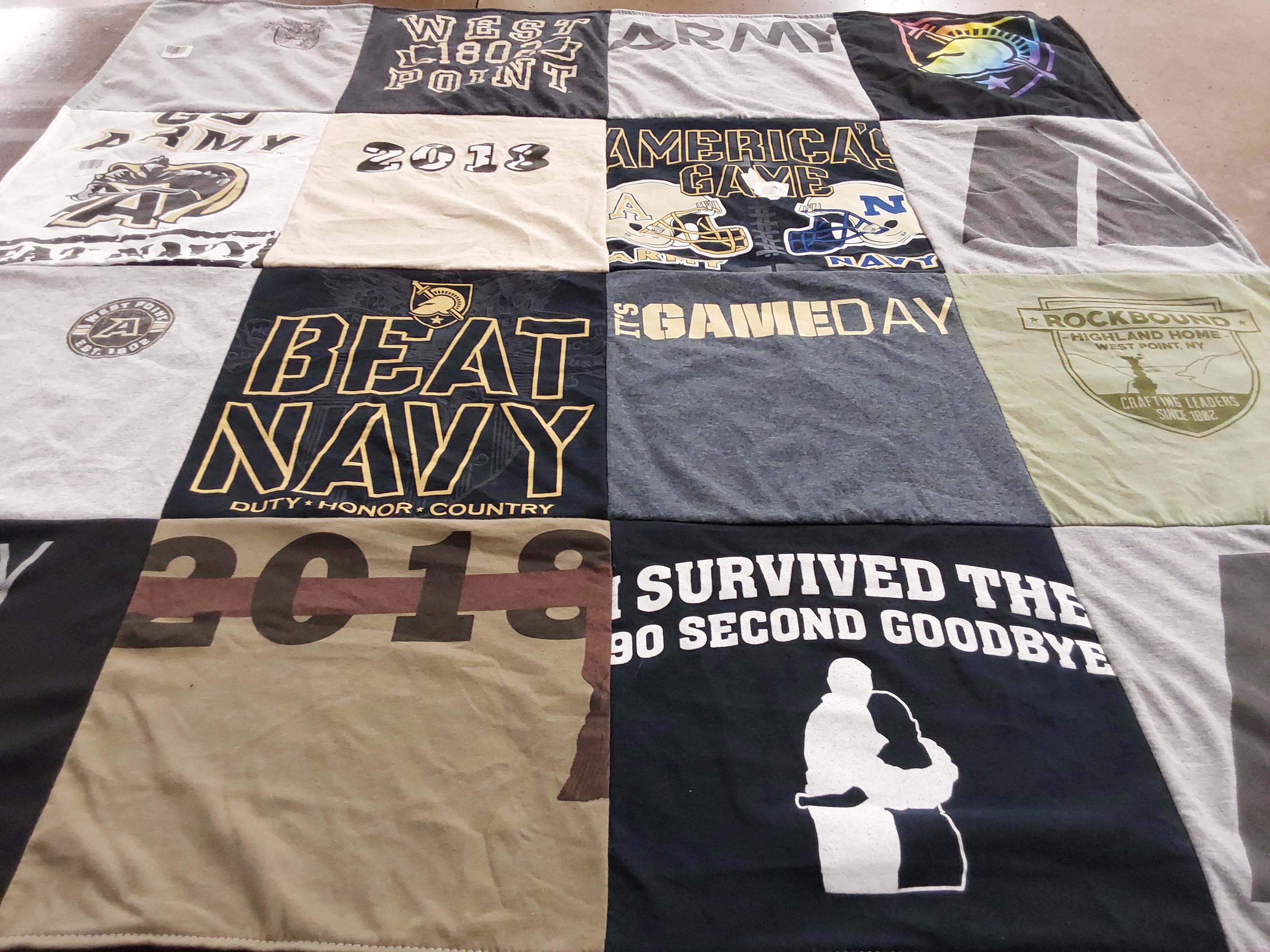 T-shirt quilt featuring army football team, navy football team by Joanie from VA