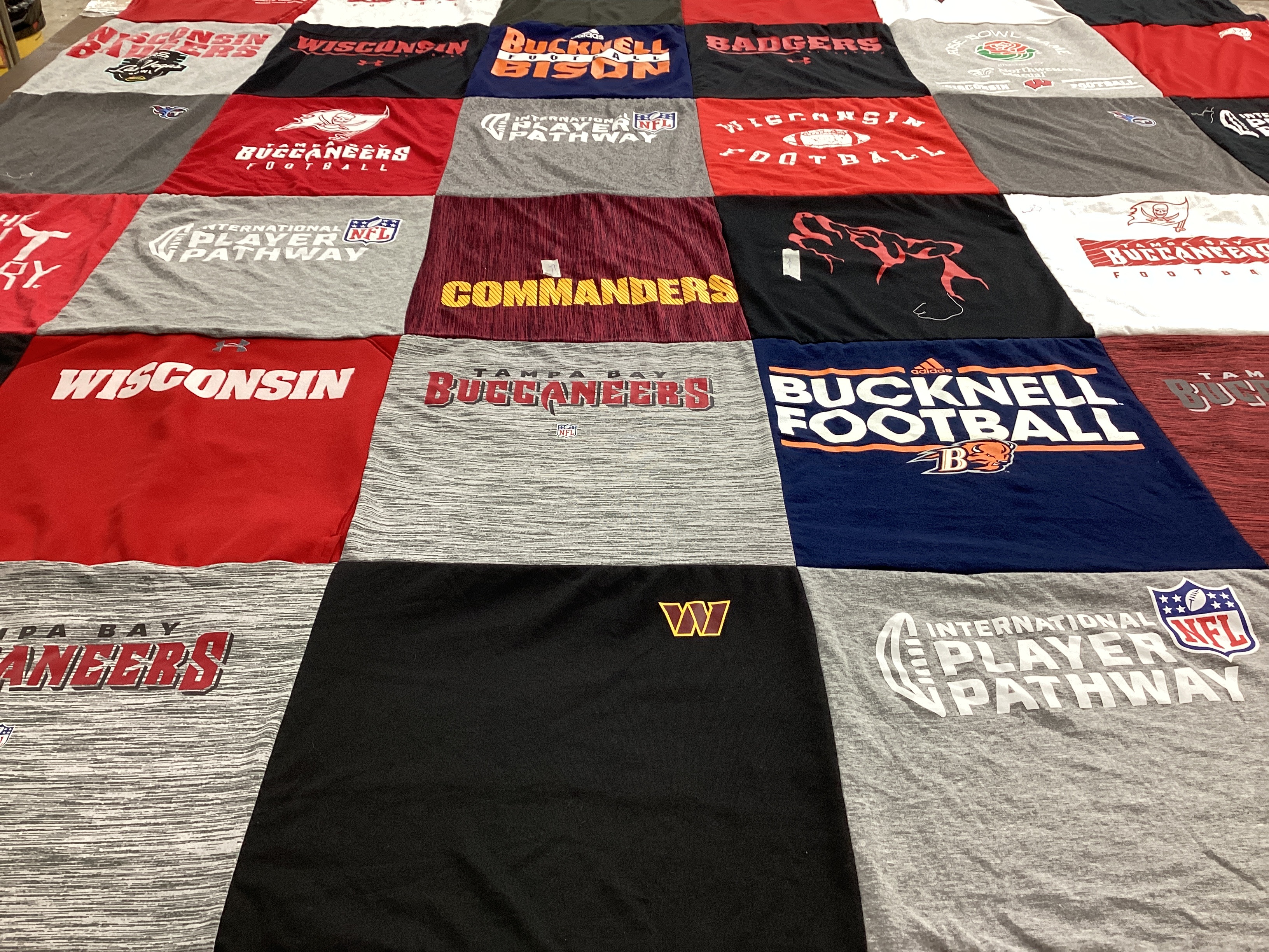 T-shirt quilt featuring wisconsin football, tampa bay buccaneers by Ashley from WI