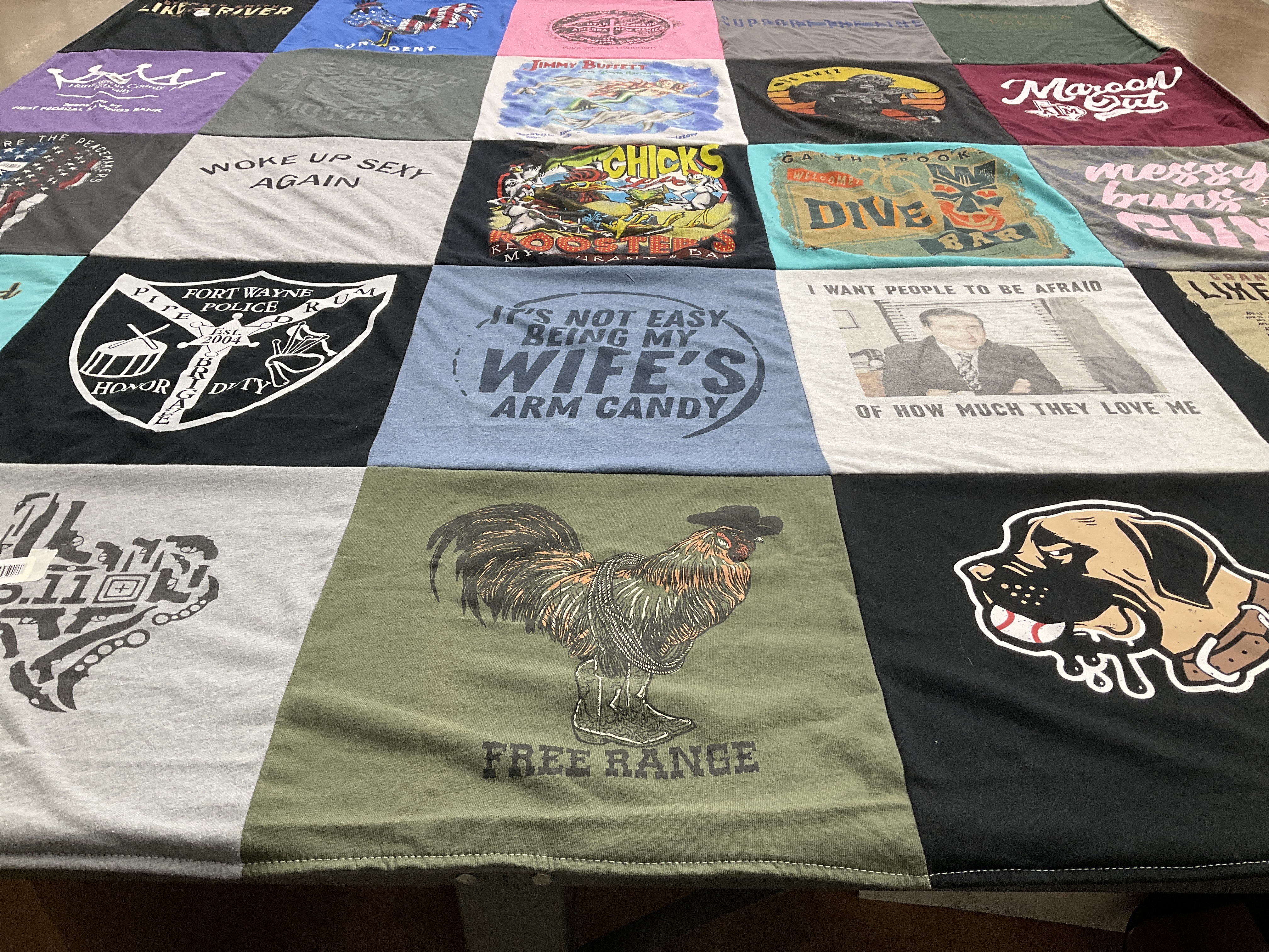 T-shirt quilt with police, humor themes by Amy from IN