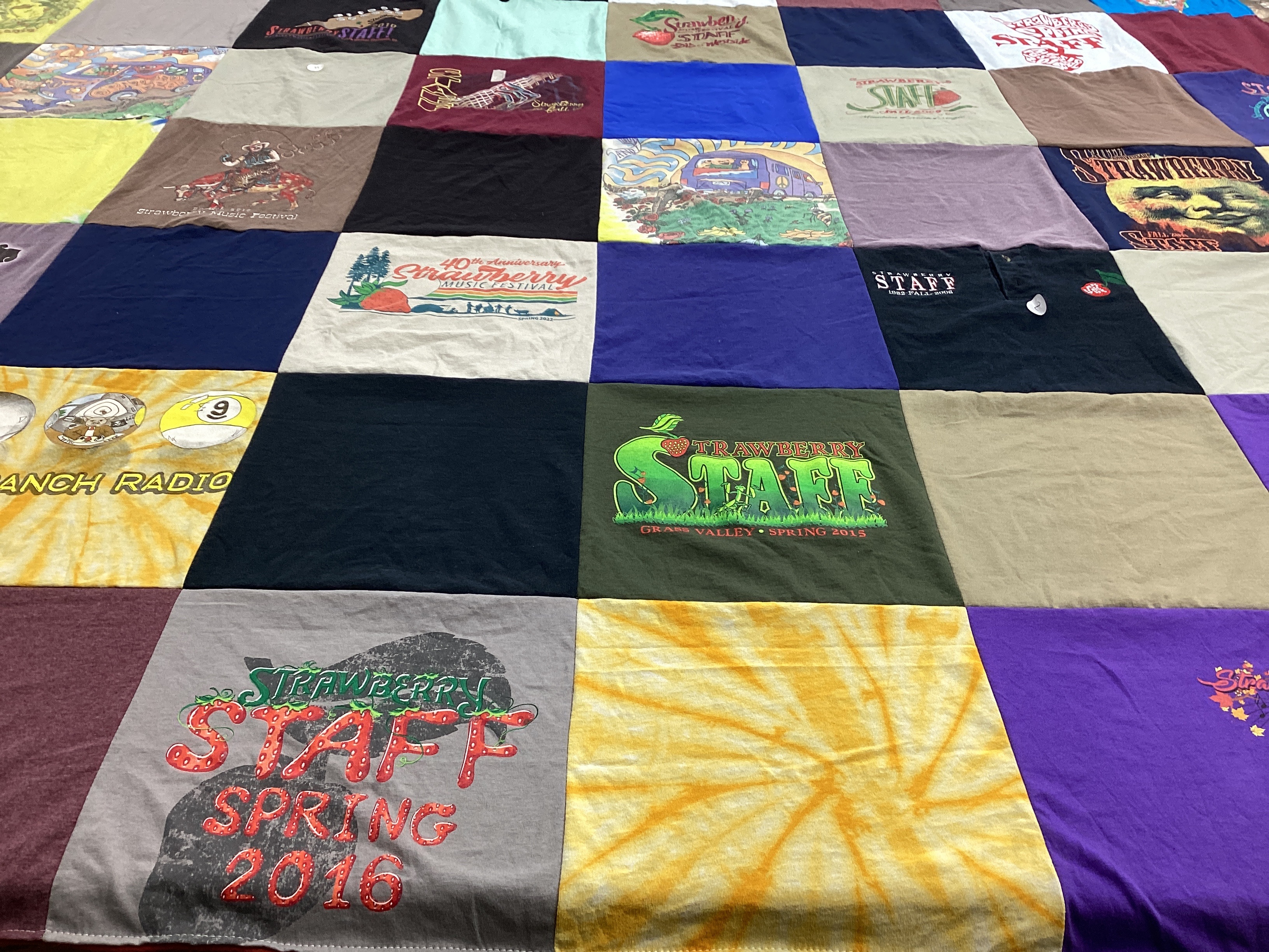 T-shirt quilt with music, festivals themes by Ed from CA