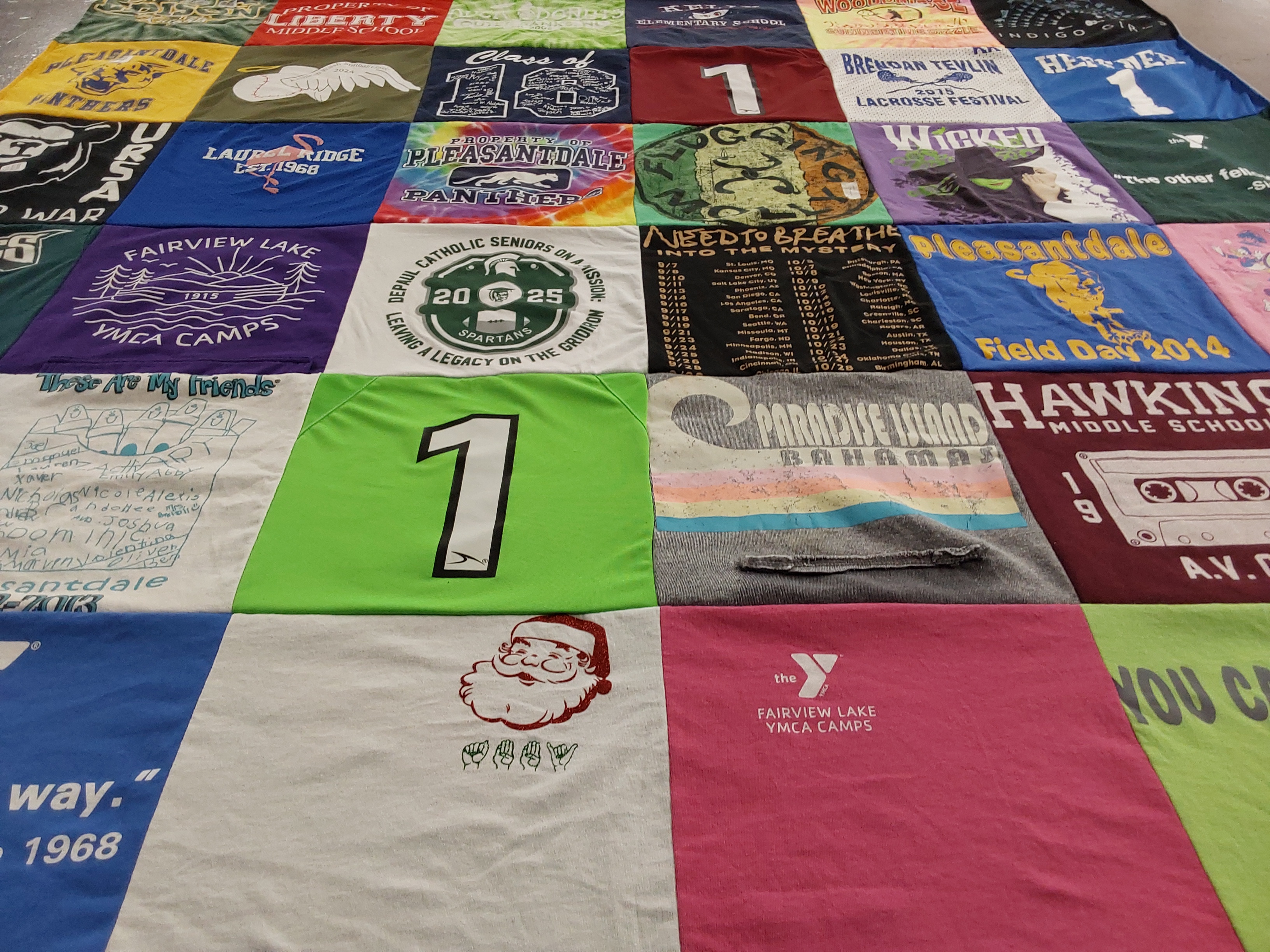T-shirt quilt featuring pleasantdale panthers, spartan team by Liz from NJ