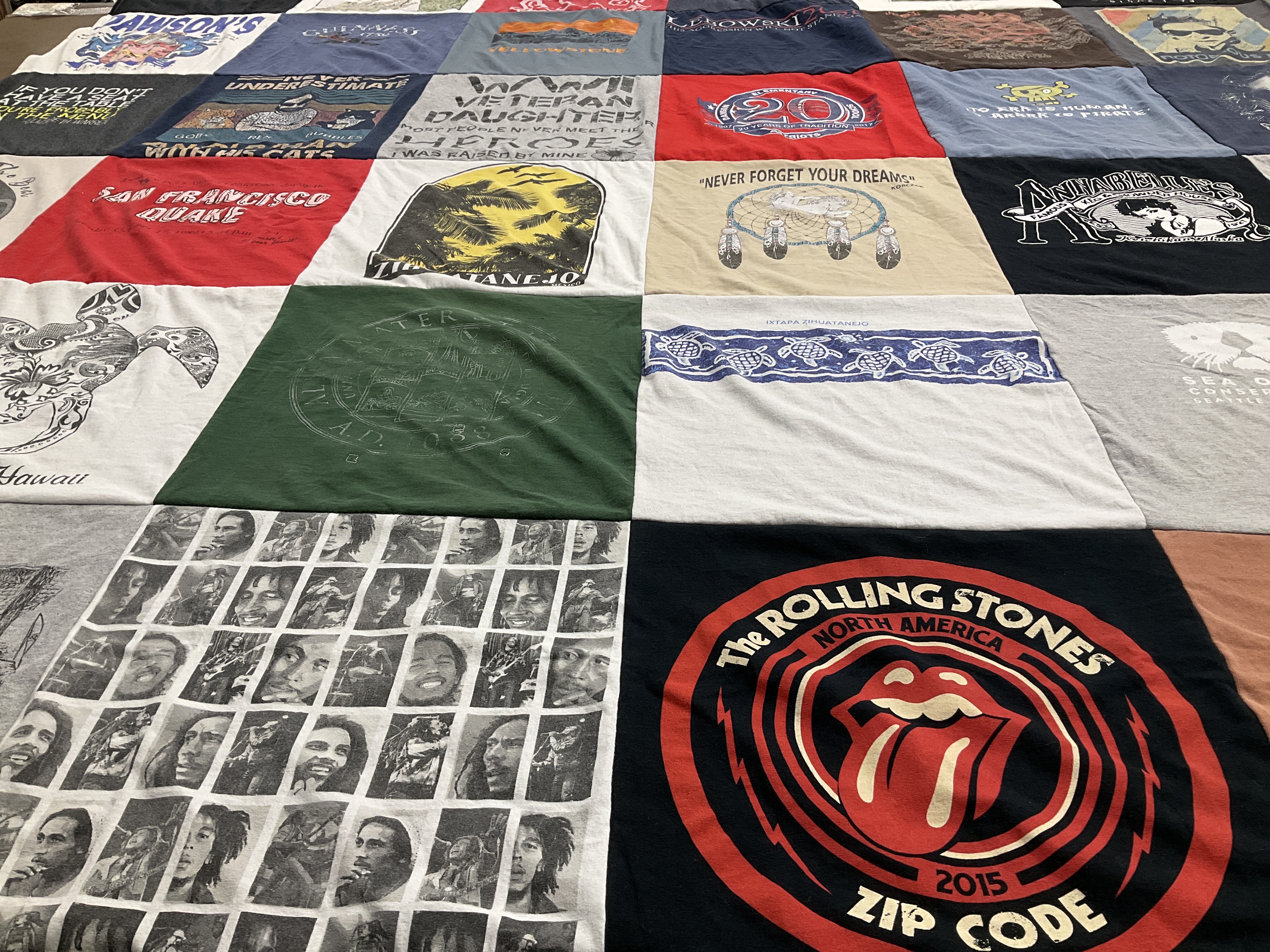 T-shirt quilt with music, travel themes by Roslyn from TX