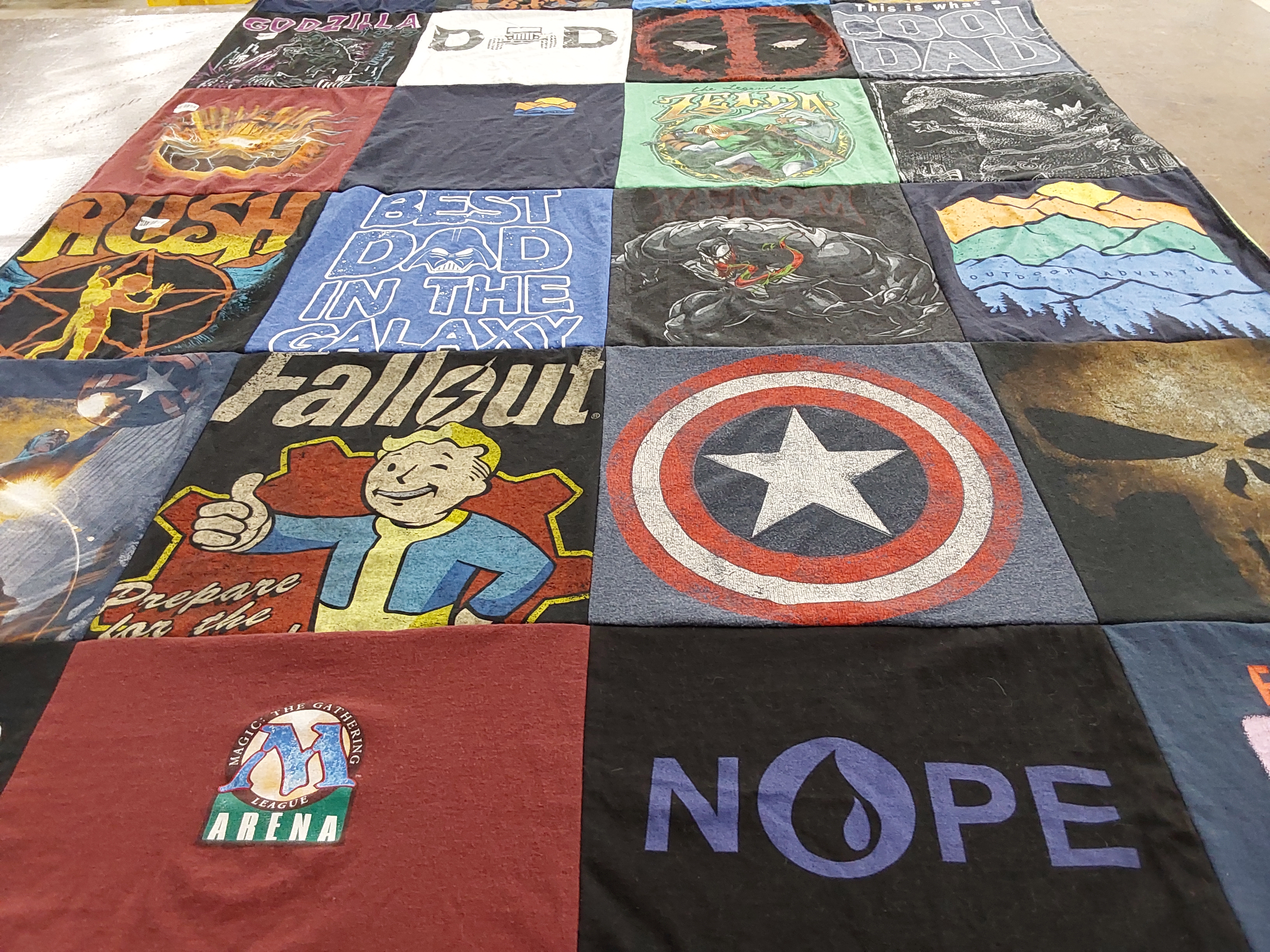 T-shirt quilt with gaming, comic books themes by Tamara from WA