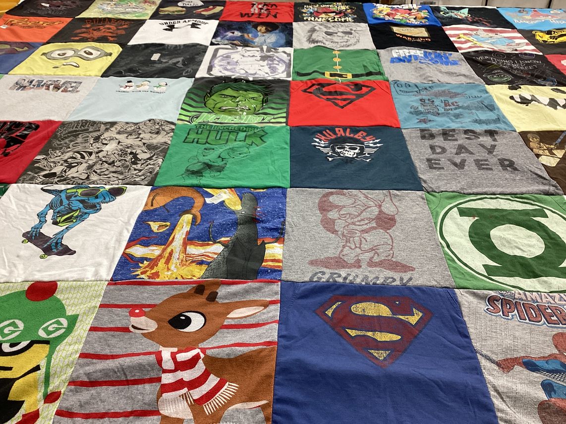 T-shirt quilt with superheroes, cartoons themes by julie from VA