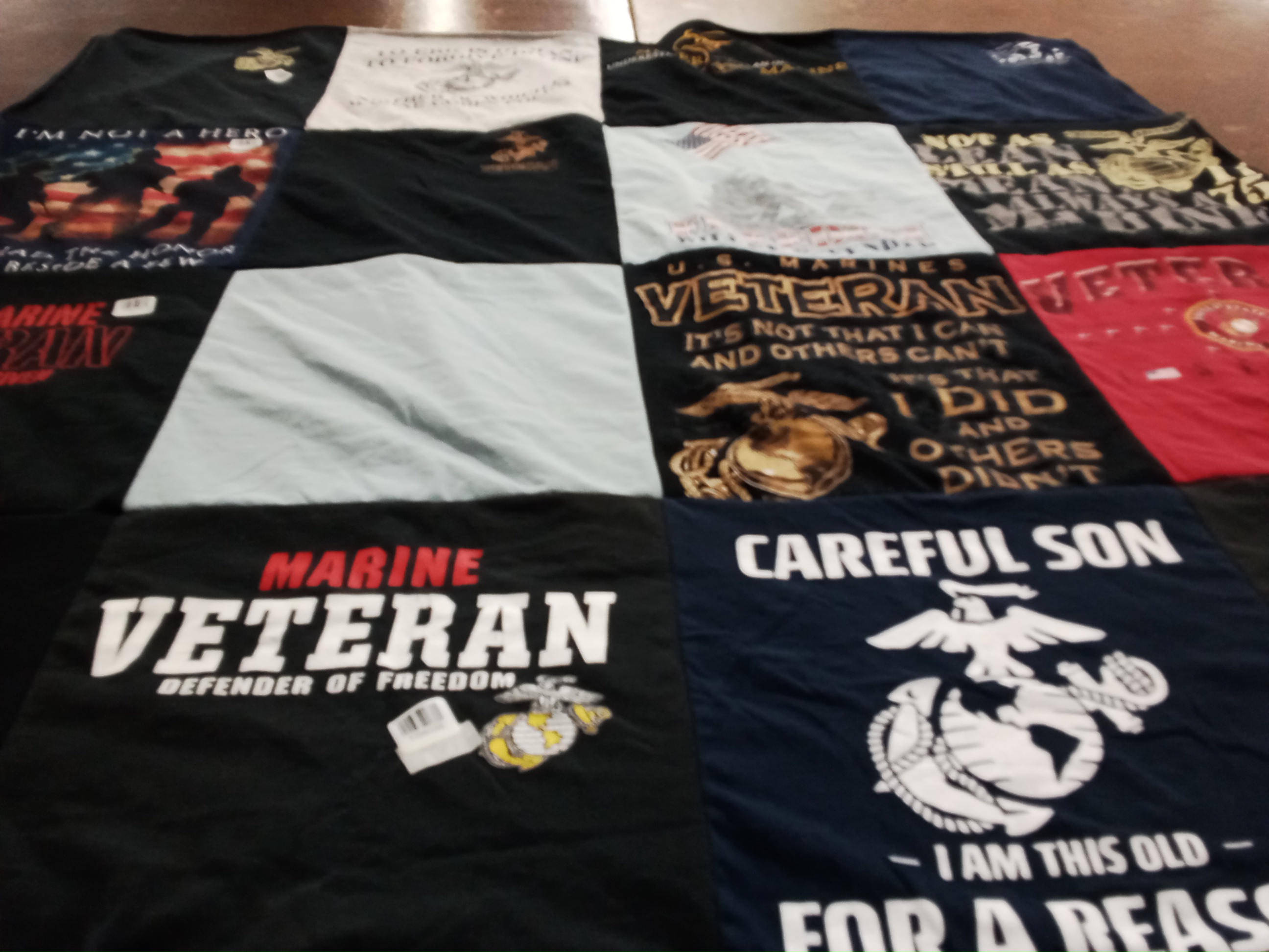 T-shirt quilt with military, veteran support themes by Cobi from FL