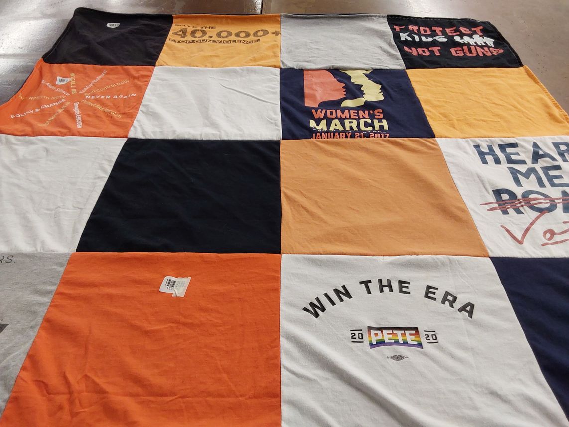 T-shirt quilt with political activism, women's rights themes by Rebecca from NC