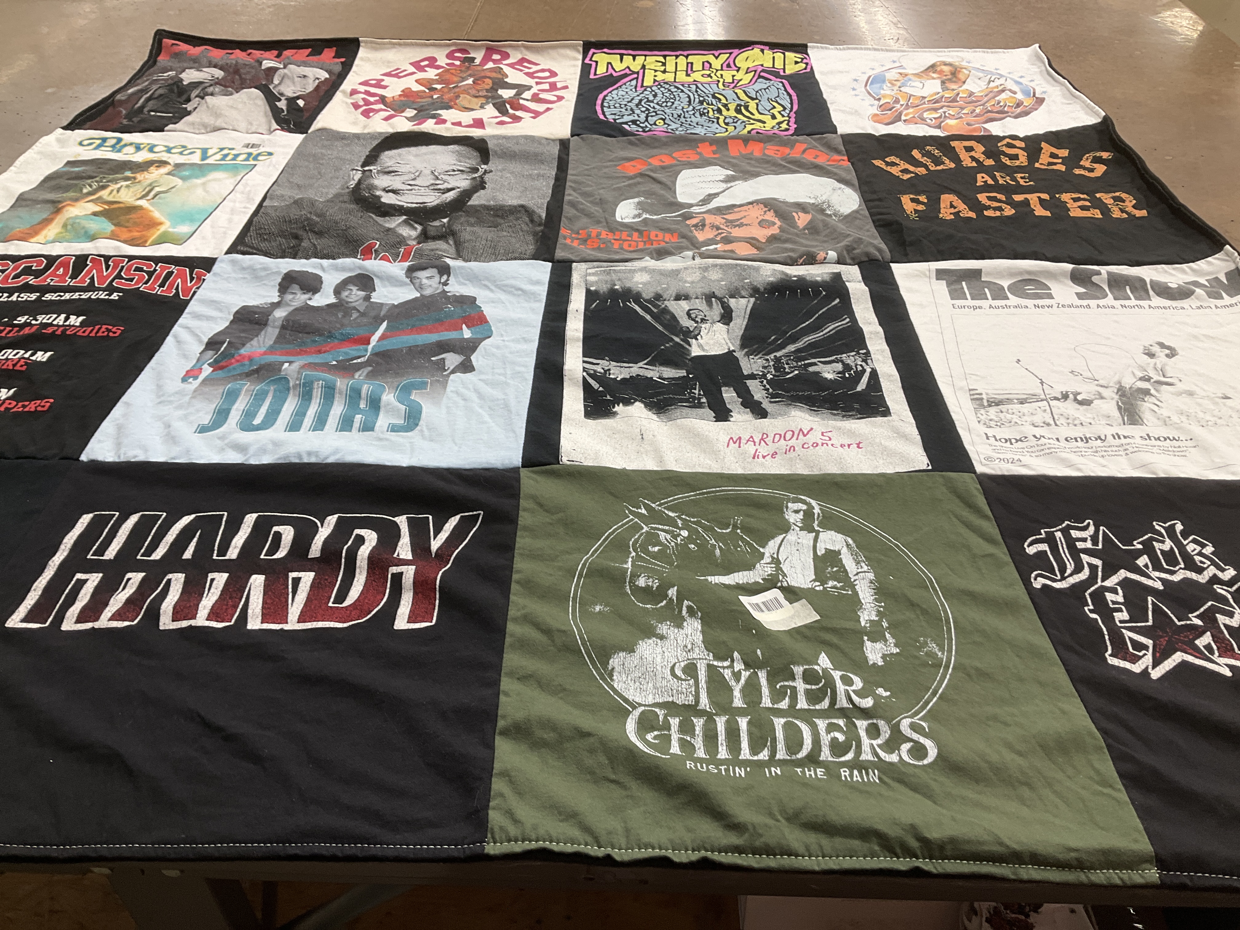 T-shirt quilt with music, concerts themes by Carley from IN