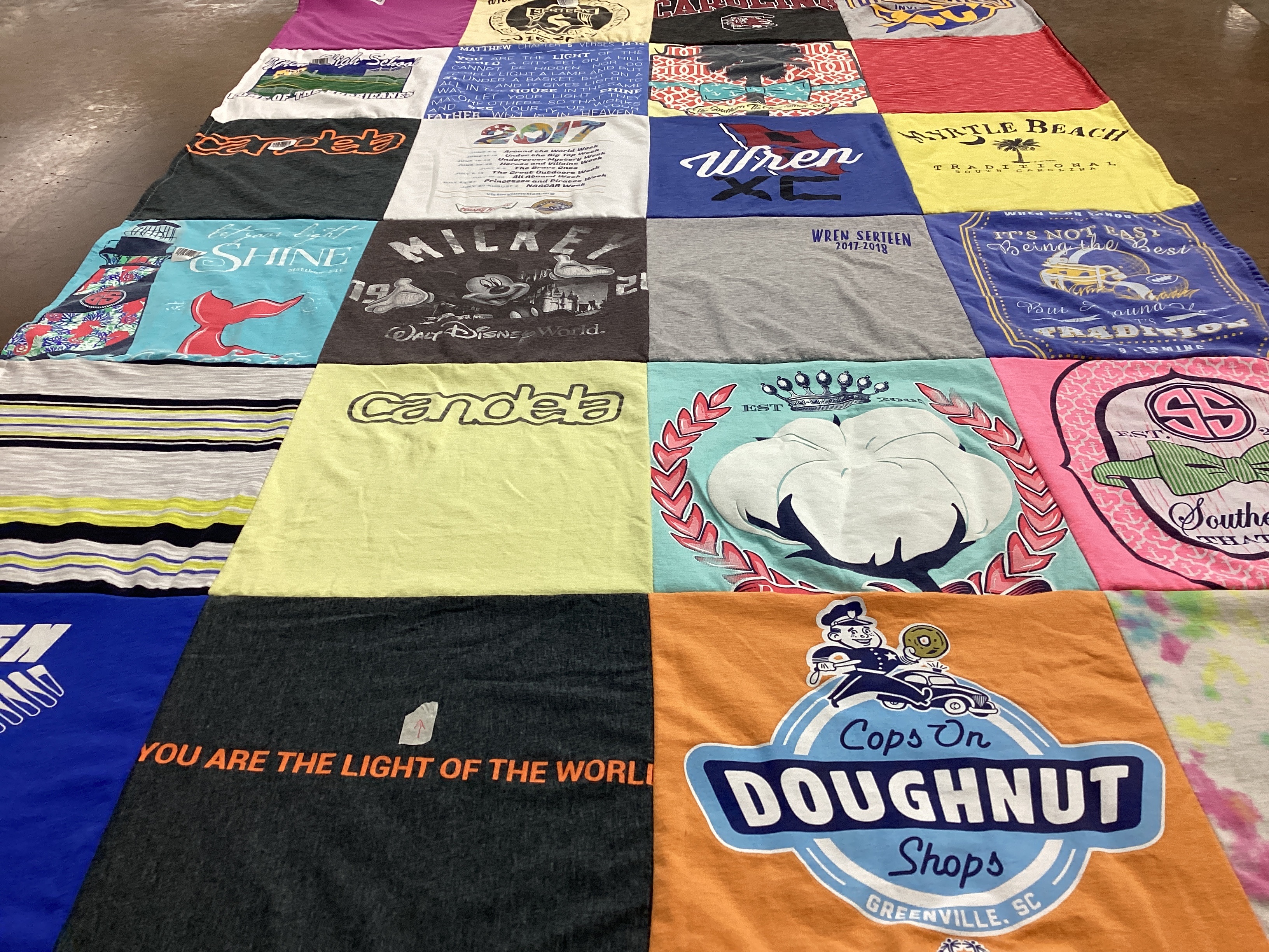 T-shirt quilt featuring wren high school cross country by Judy from SC