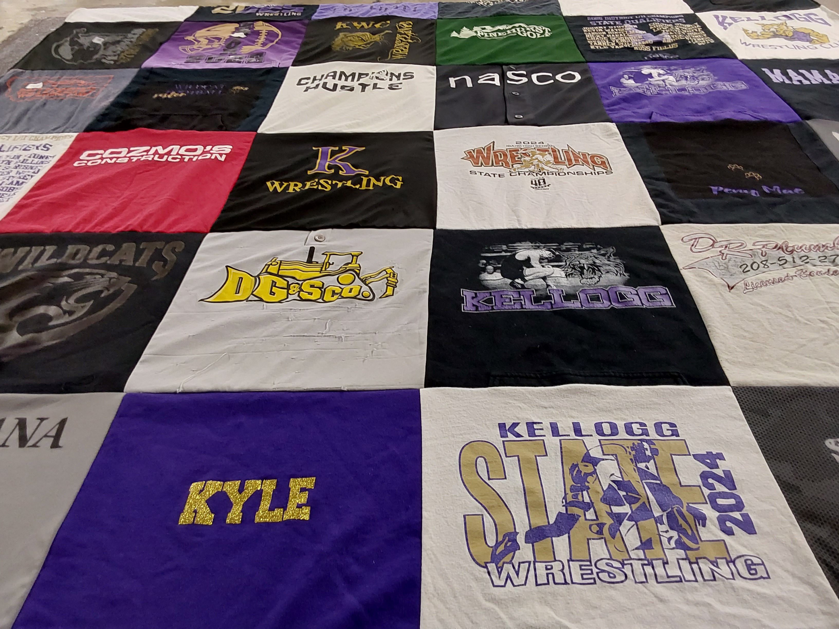 T-shirt quilt featuring kellogg wrestling by Tiffany from ID