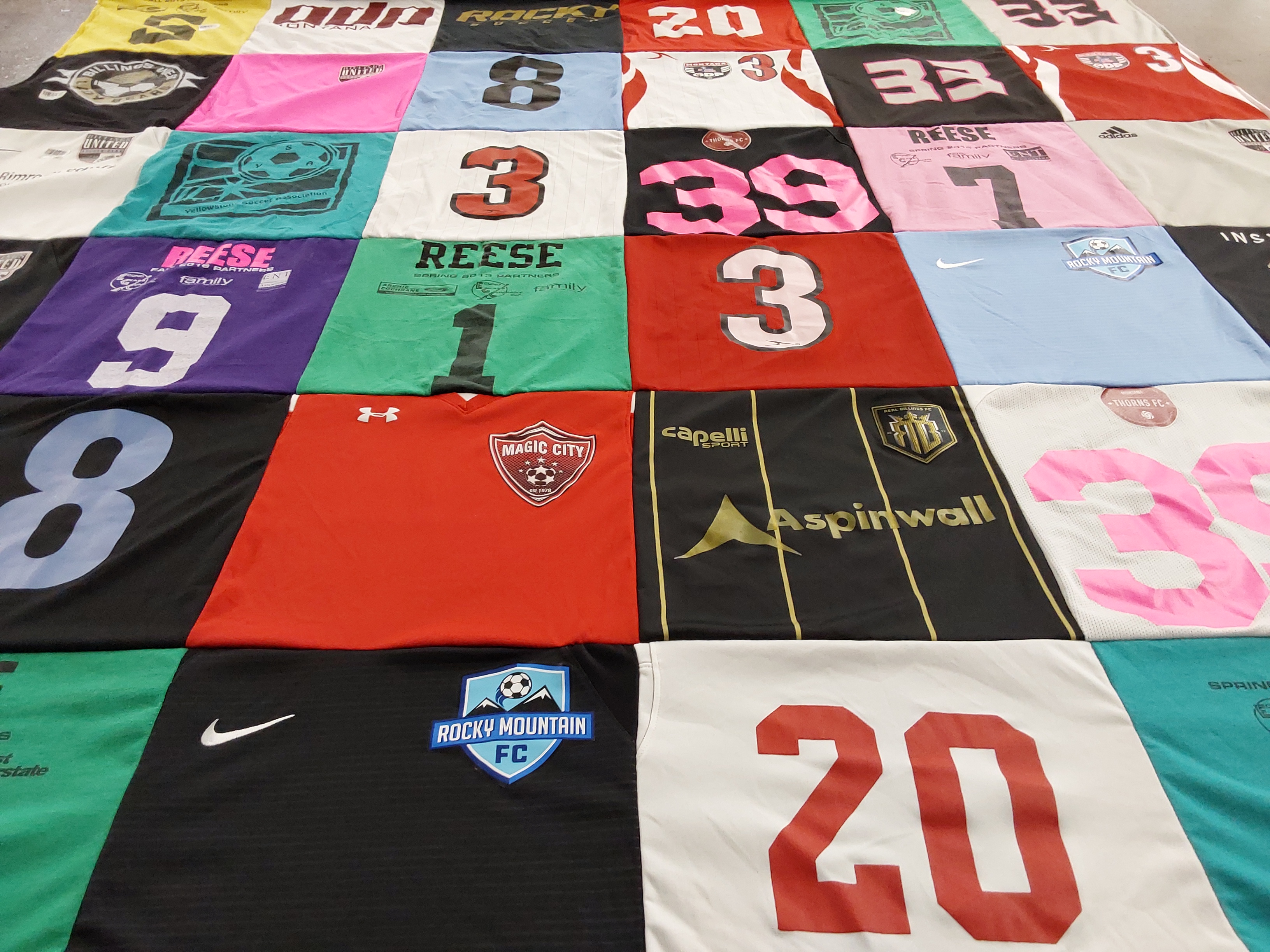 T-shirt quilt with soccer, sports themes by Lacey from MT