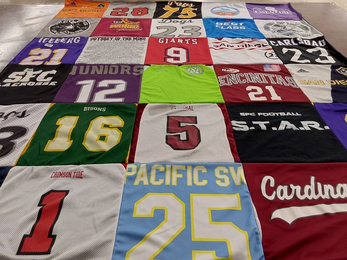 T-shirt quilt featuring cardinal, bison by Jessica Berg from CA
