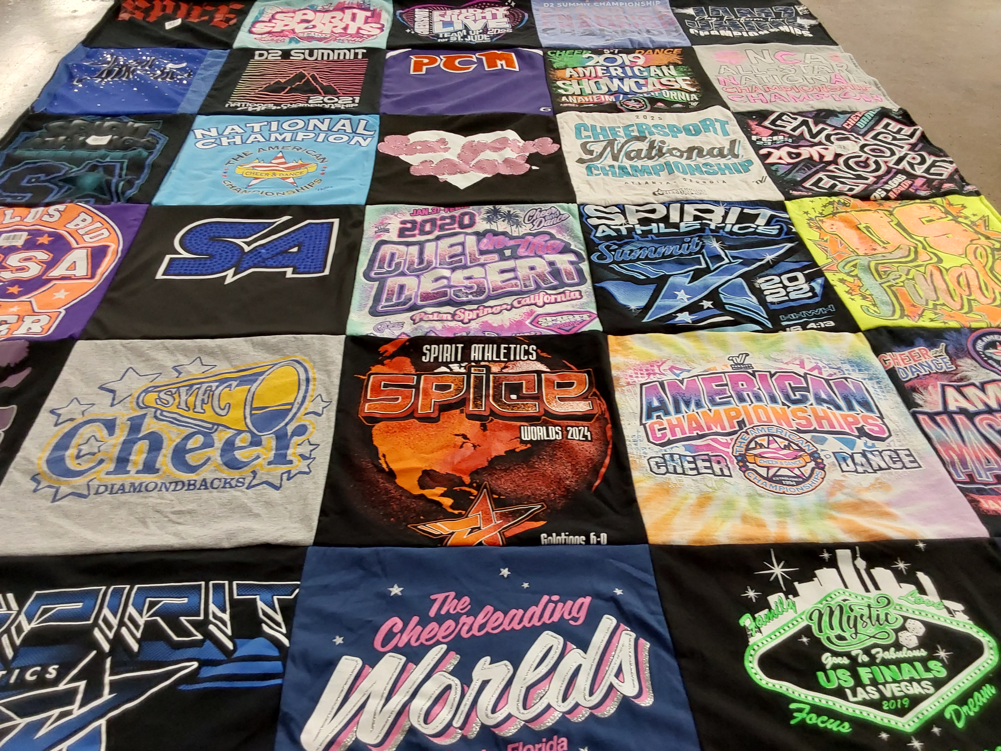 T-shirt quilt with cheerleading, dance competitions themes by Victoria from CA