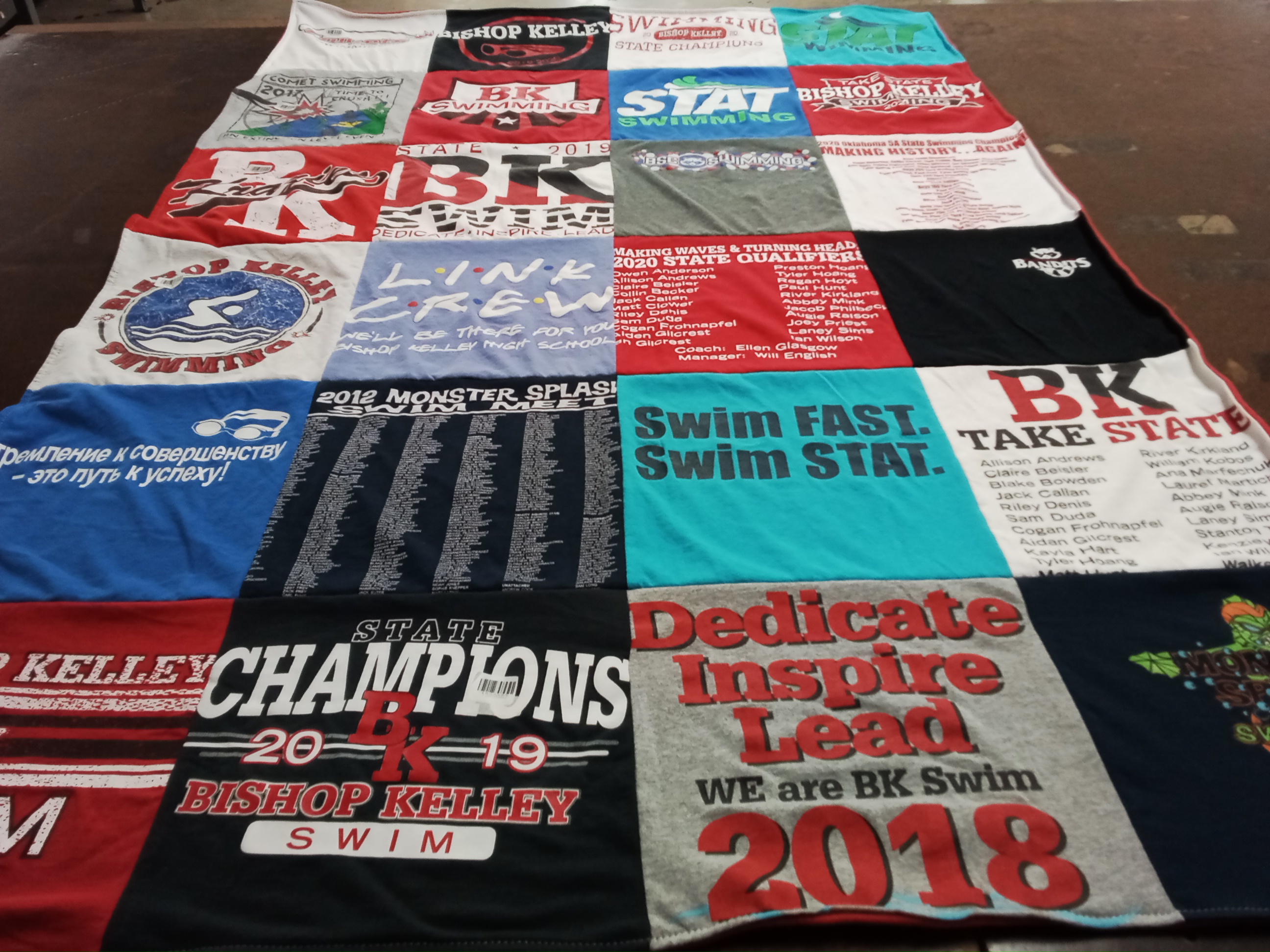 T-shirt quilt featuring bishop kelley swim team by Megan from OK