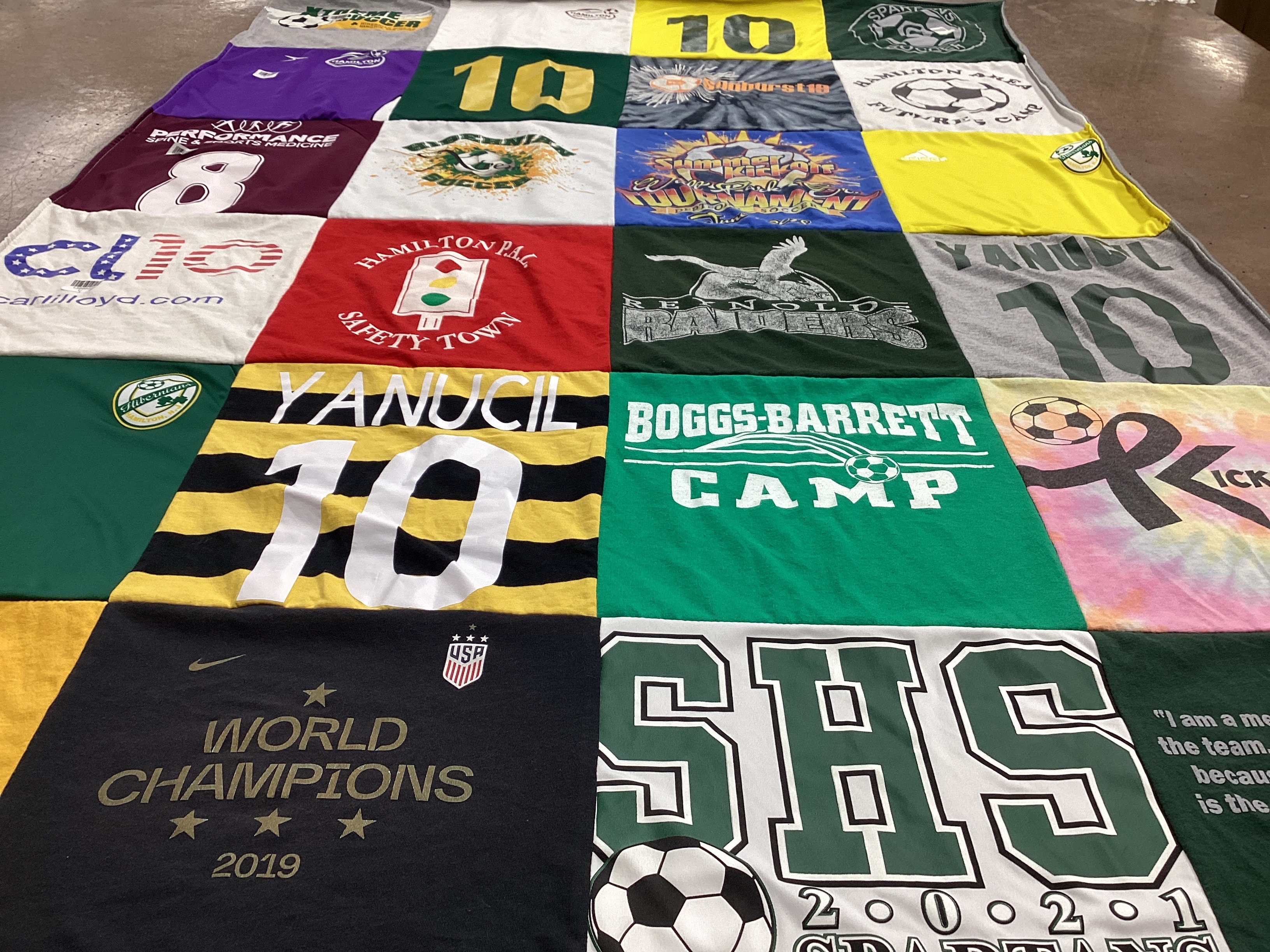 T-shirt quilt featuring sheridan high school spartan soccer by Jennifer from NJ