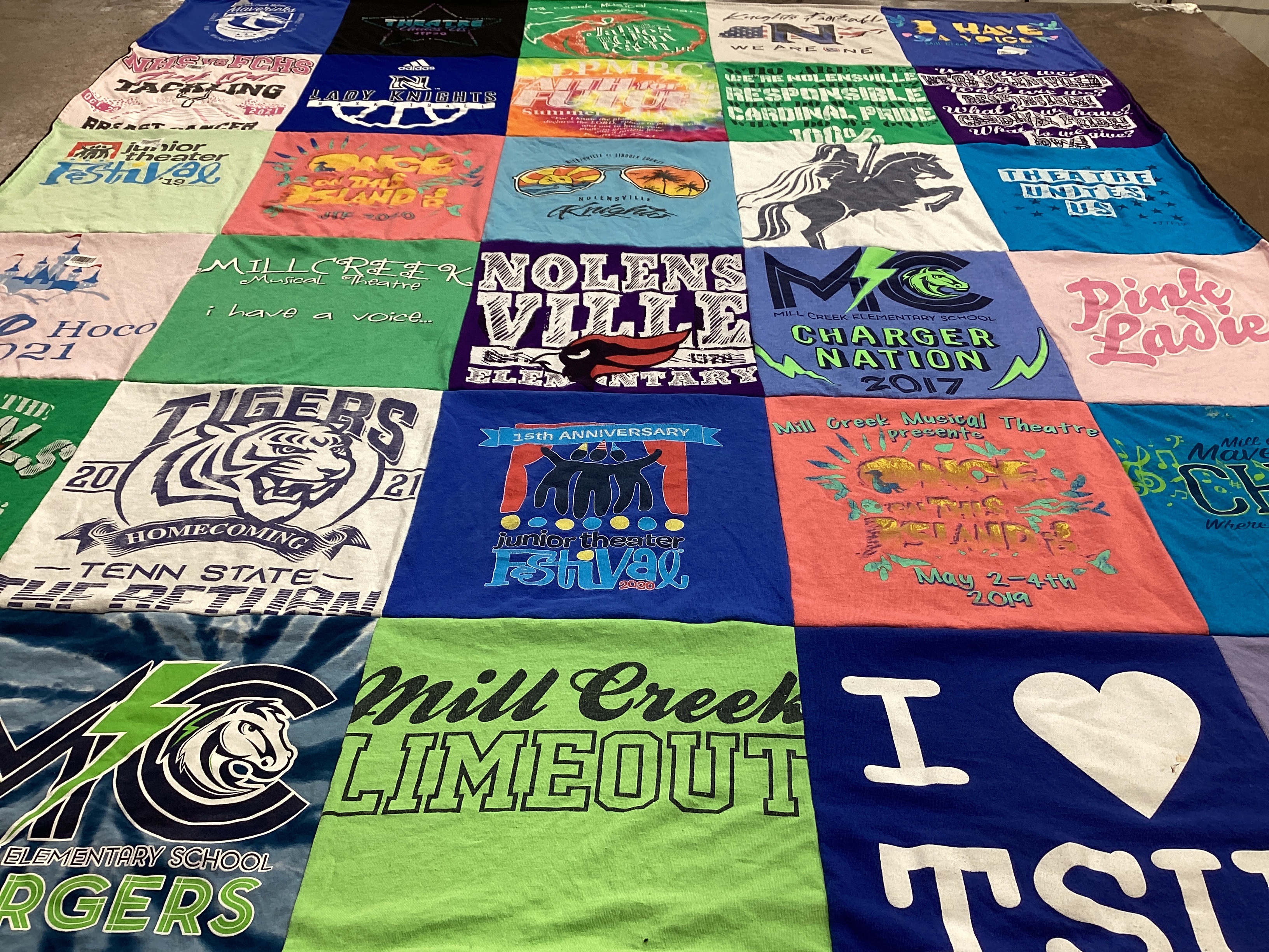 T-shirt quilt featuring mill creek chargers, blackman tigers by Pamela from TN