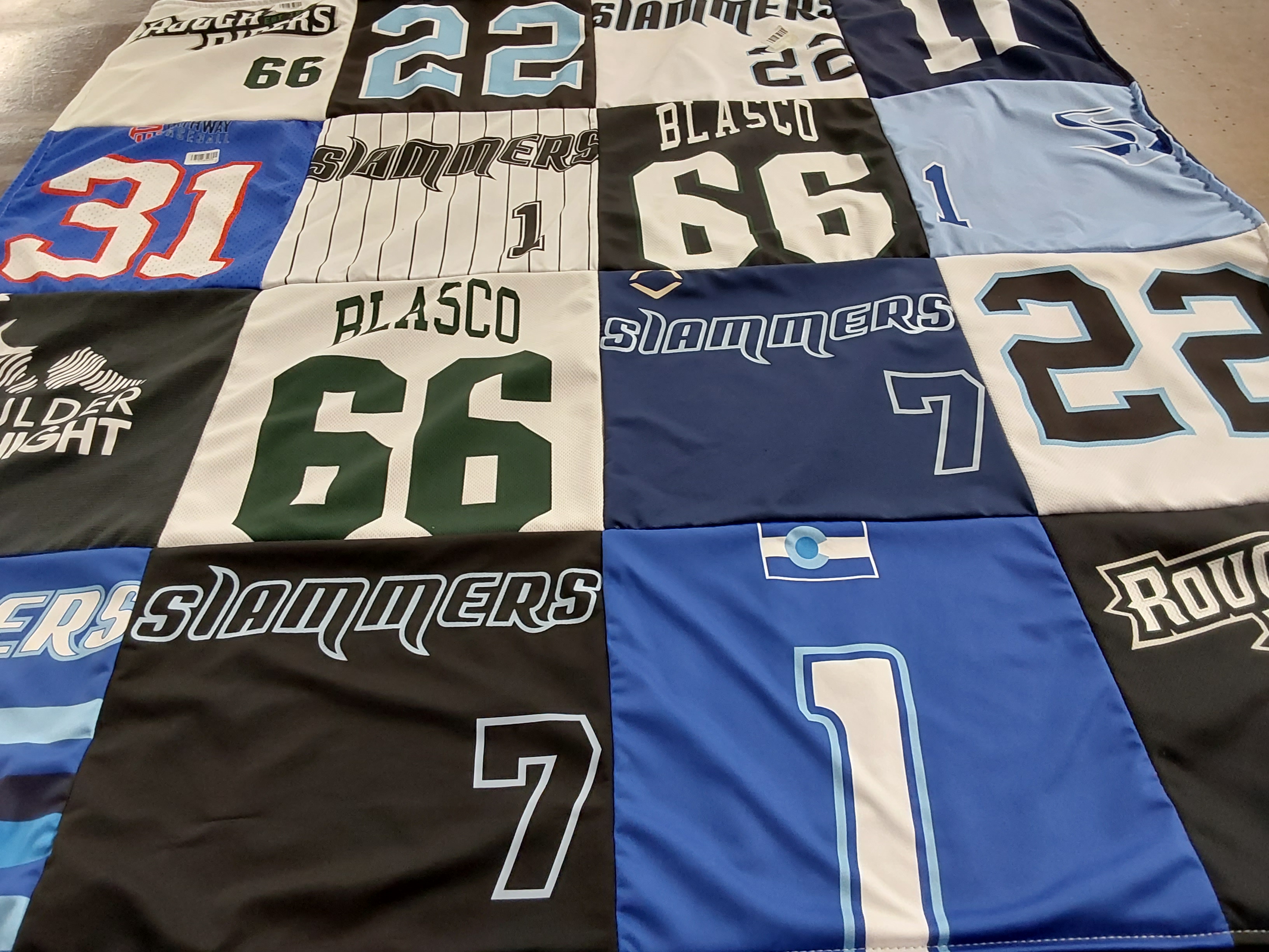 T-shirt quilt with sports, team spirit themes by Vanessa from CO