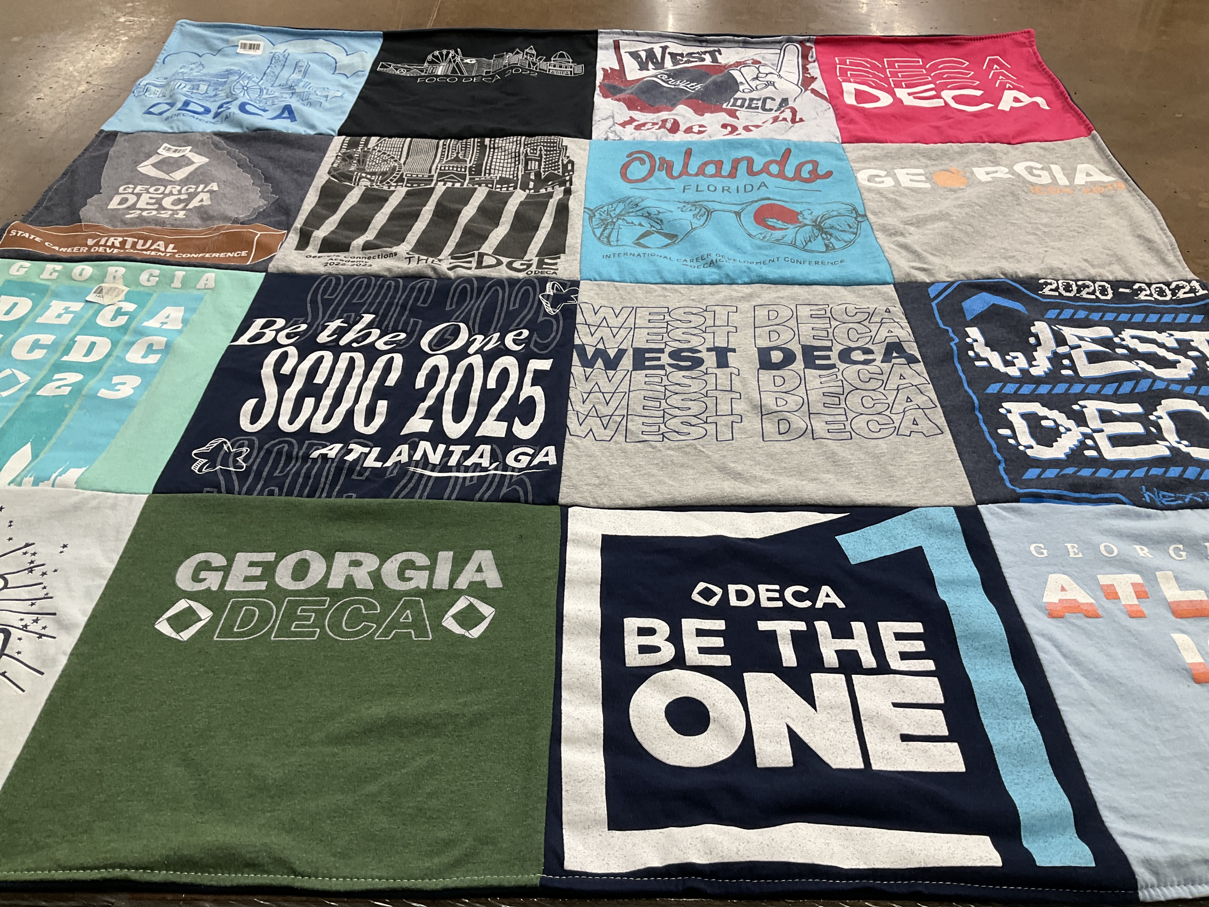 T-shirt quilt with business, leadership themes by Jamie from GA