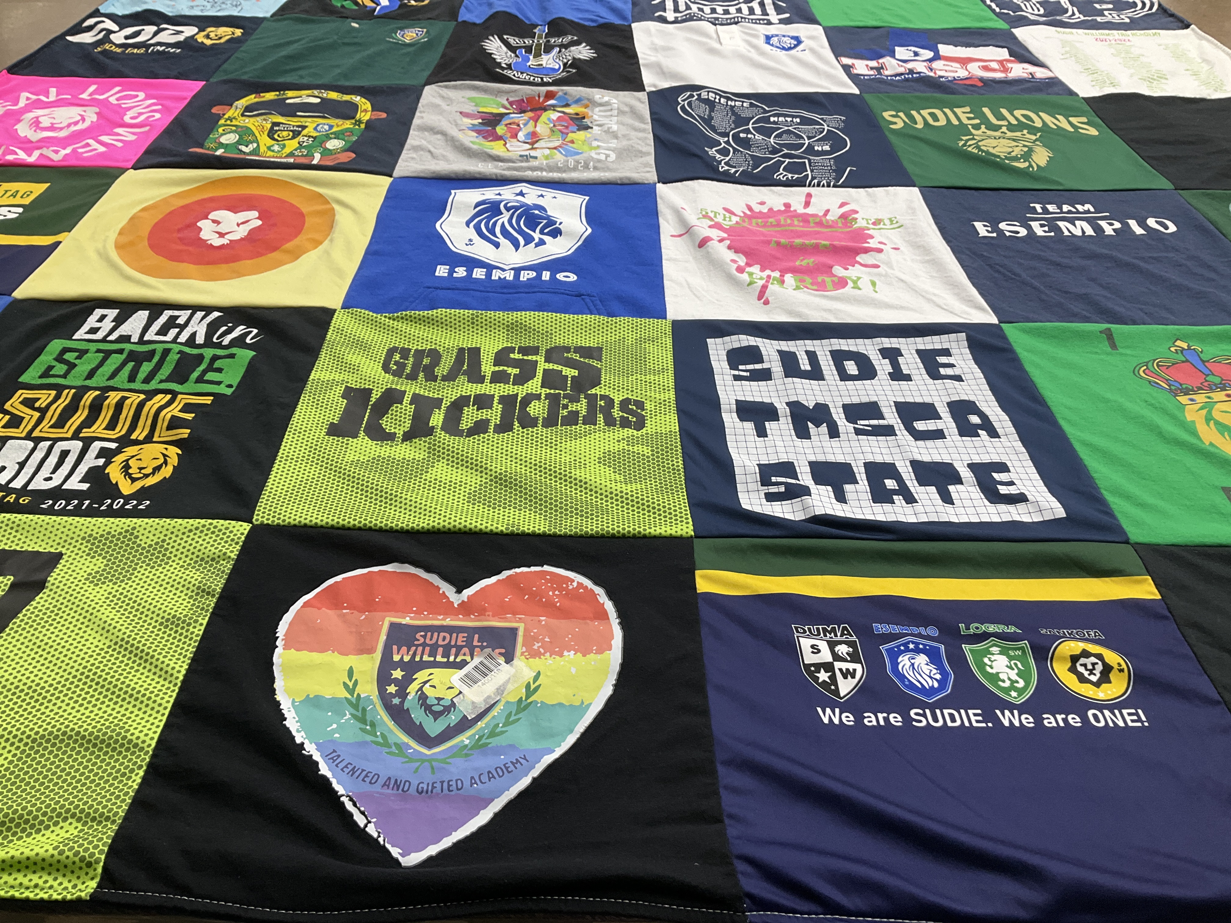 T-shirt quilt featuring sudie lions by Nikki from TX
