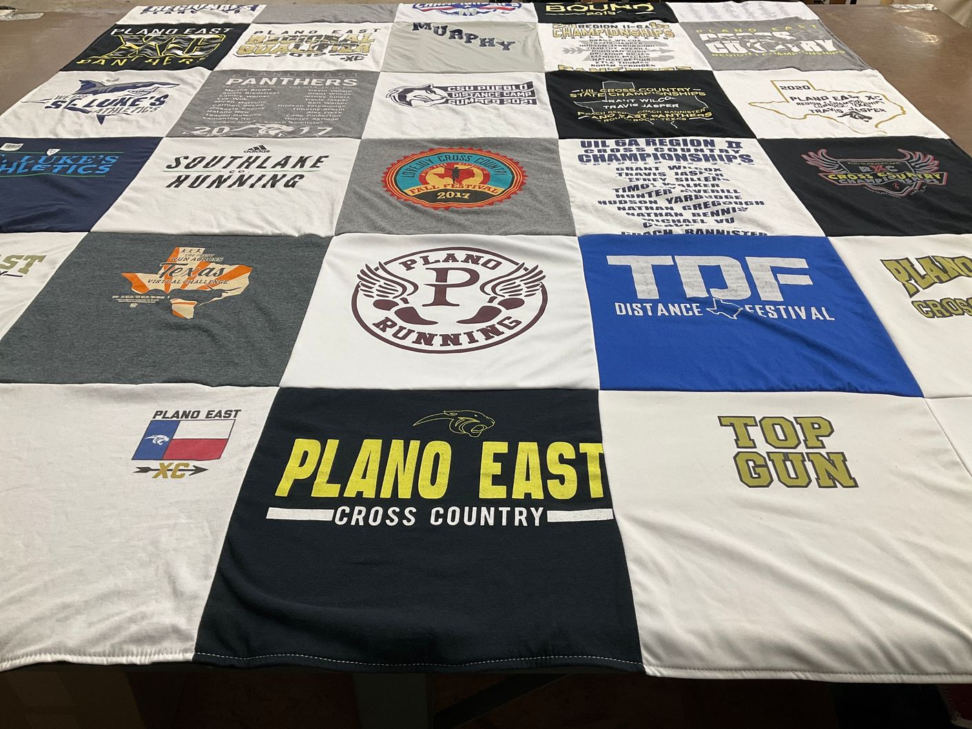 T-shirt quilt featuring plano east cross country team by Elisa from TX