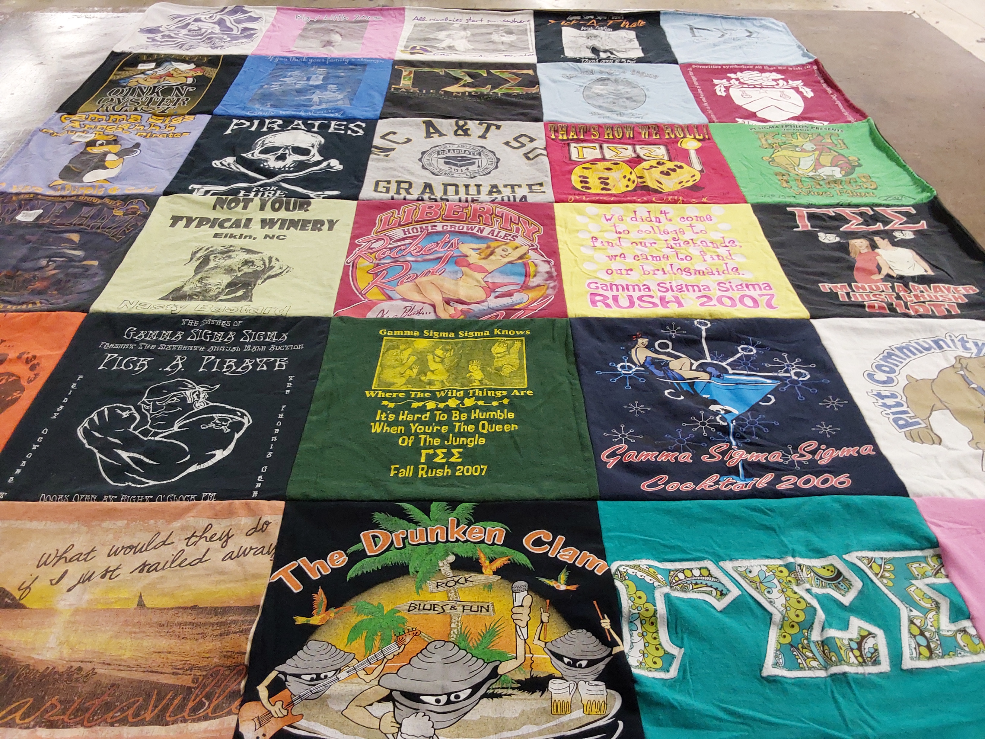 T-shirt quilt with fraternities, winery themes by Morgan from NC