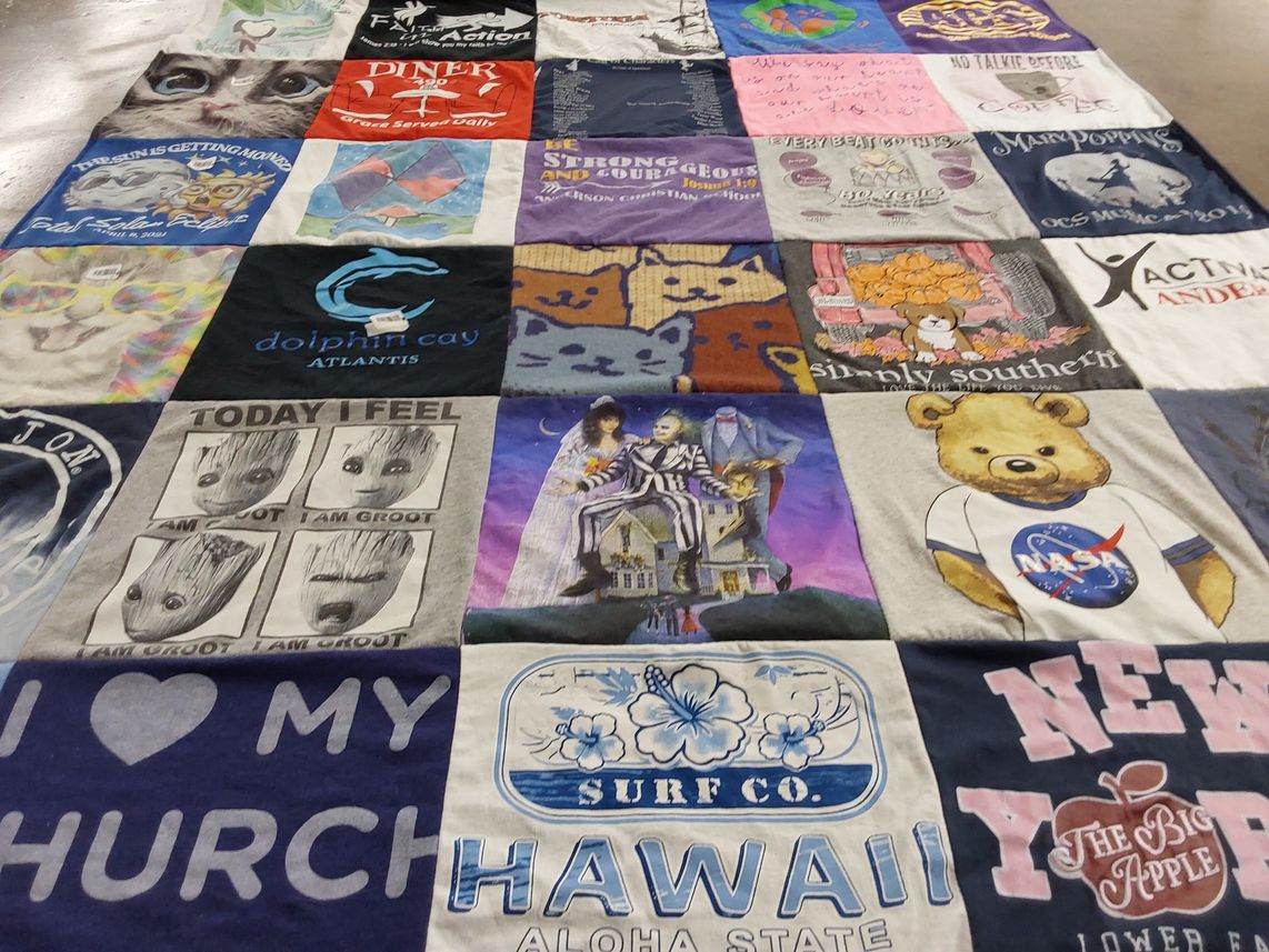 T-shirt quilt with travel, food themes by John steven from SC