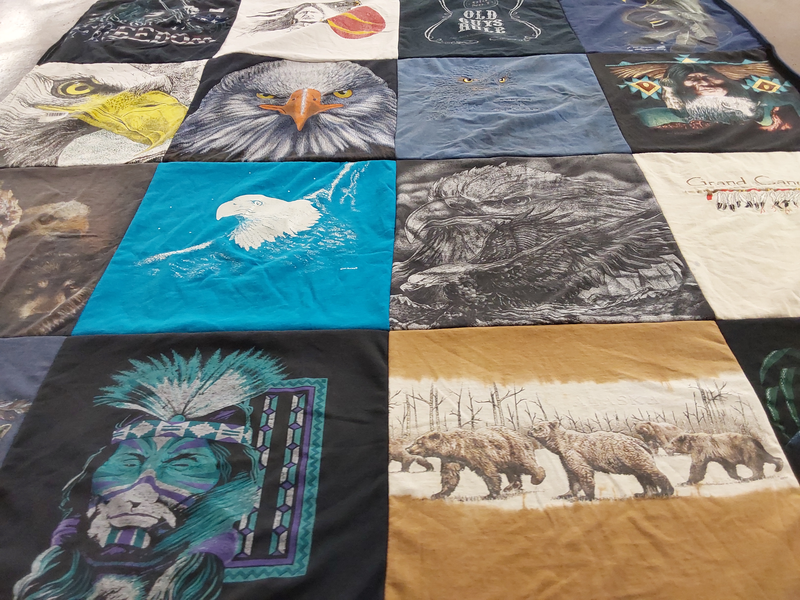 T-shirt quilt with eagles, bears themes by Kathy from IL