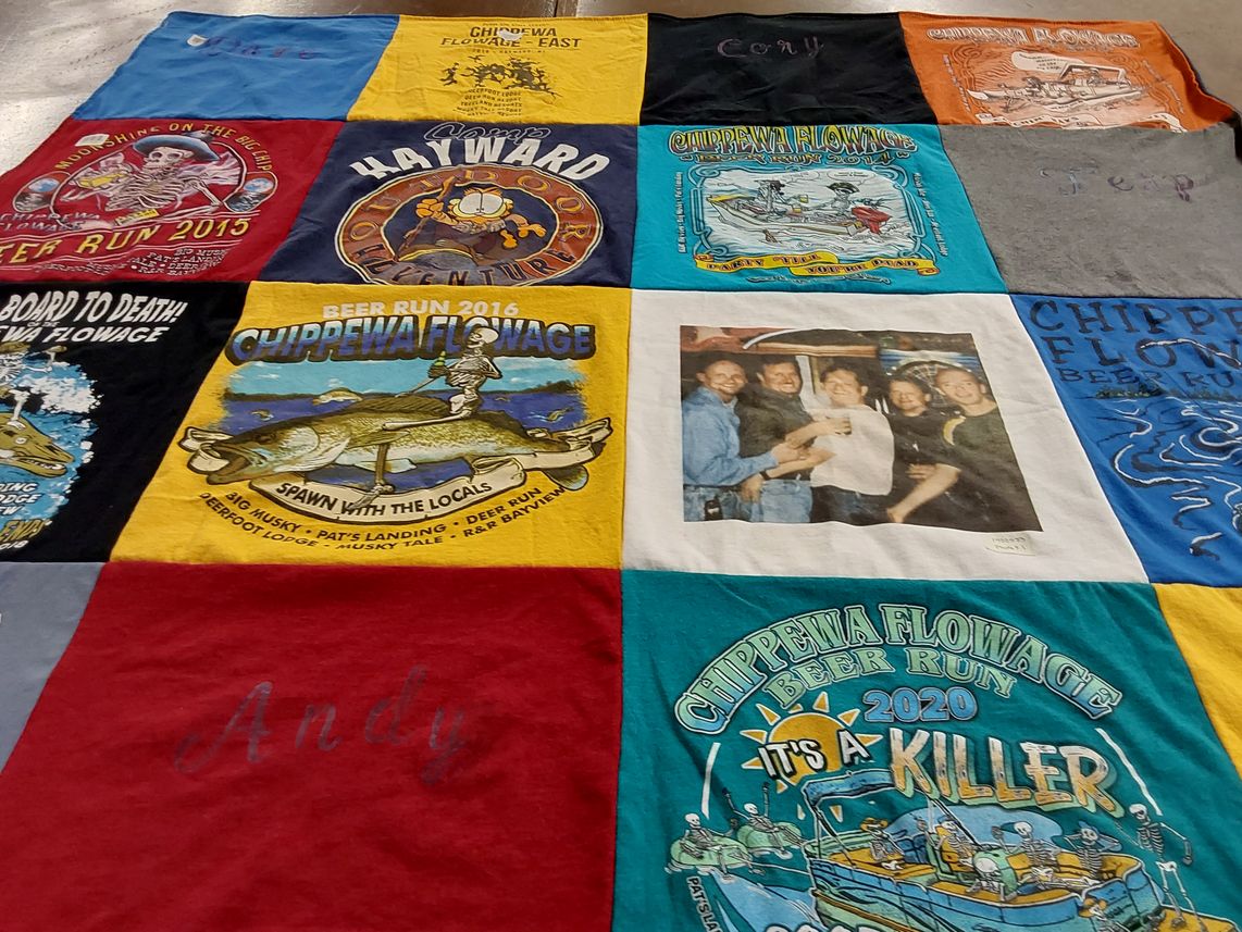 T-shirt quilt with fishing, boating themes by Jan from WI