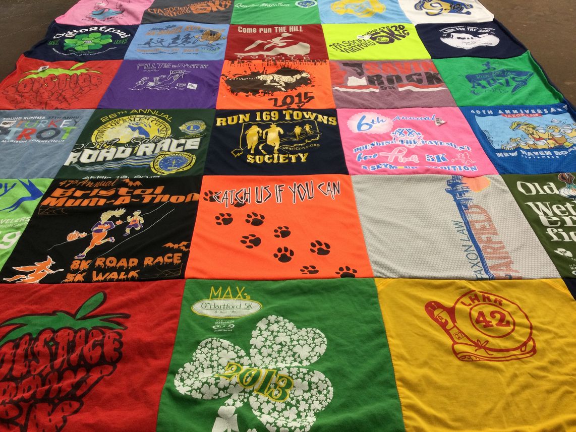 T-shirt quilt with running, community events themes by Karen from CT