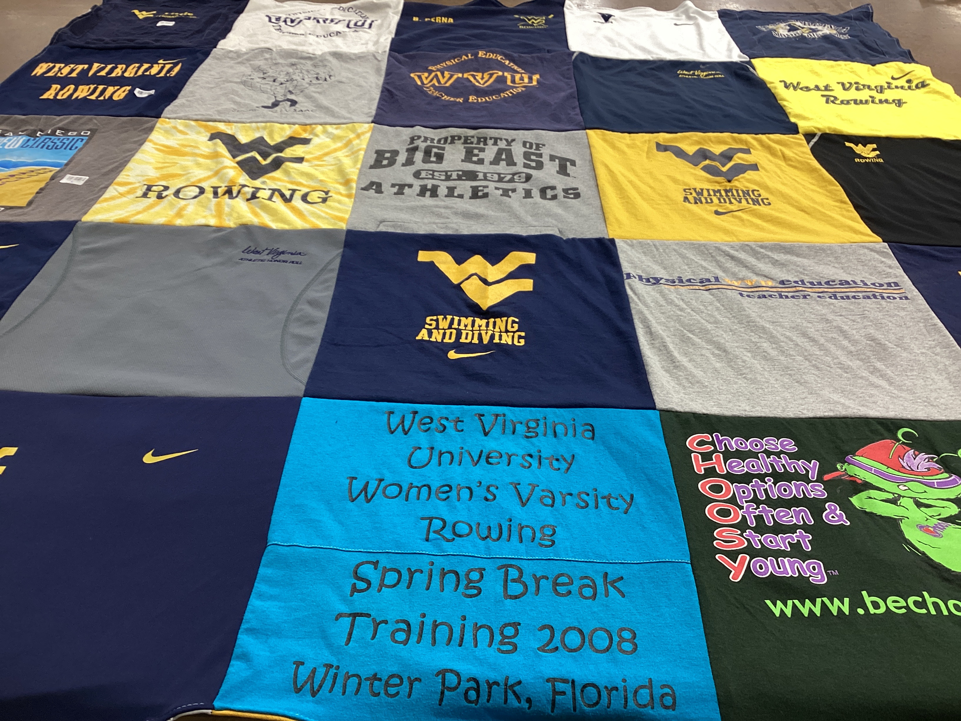T-shirt quilt featuring west virginia university swimming and diving, west virginia university rowing by Bethaney from NC