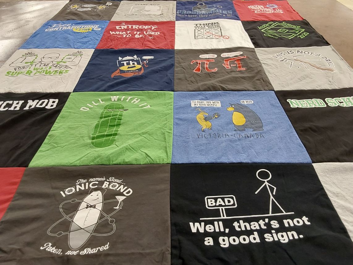 T-shirt quilt with science, humor themes by Molly from VA
